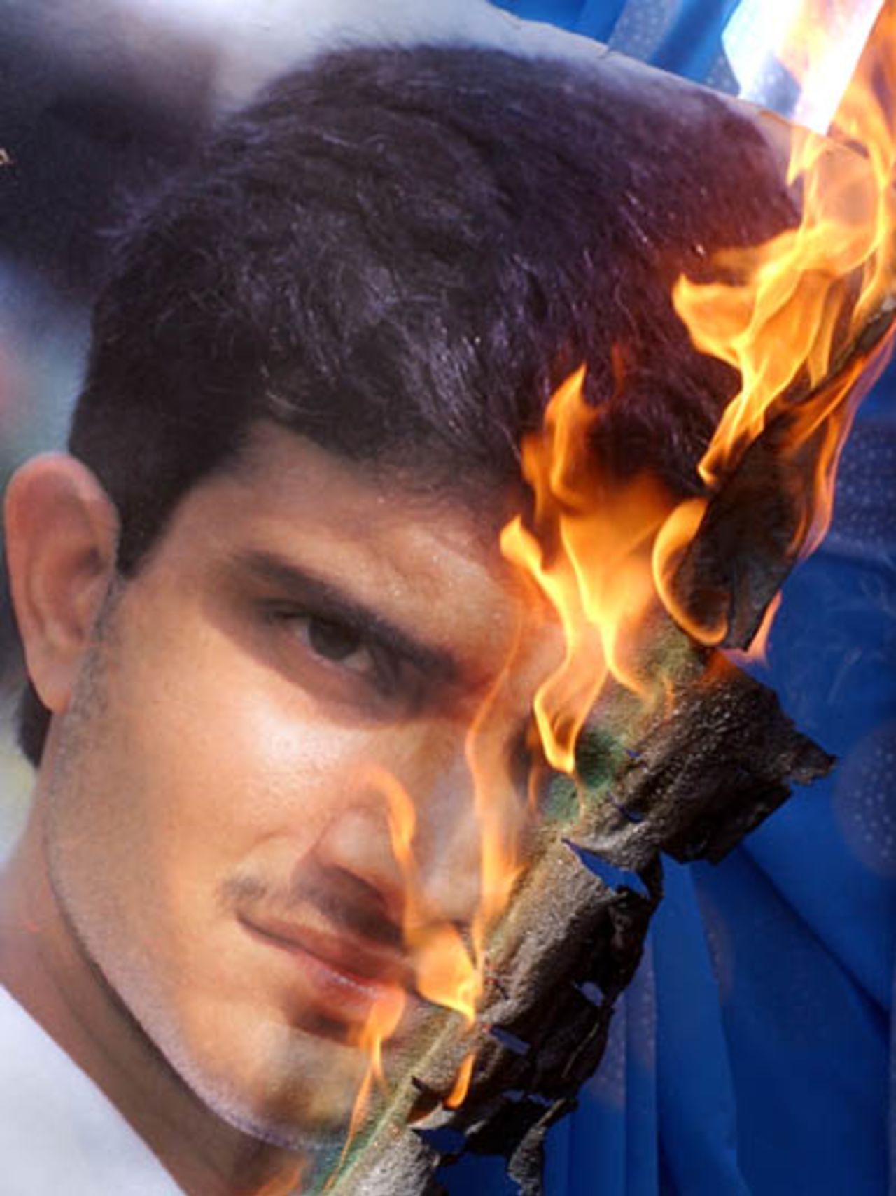 Angry fans set fire to a poster of Sourav Ganguly in Mumbai