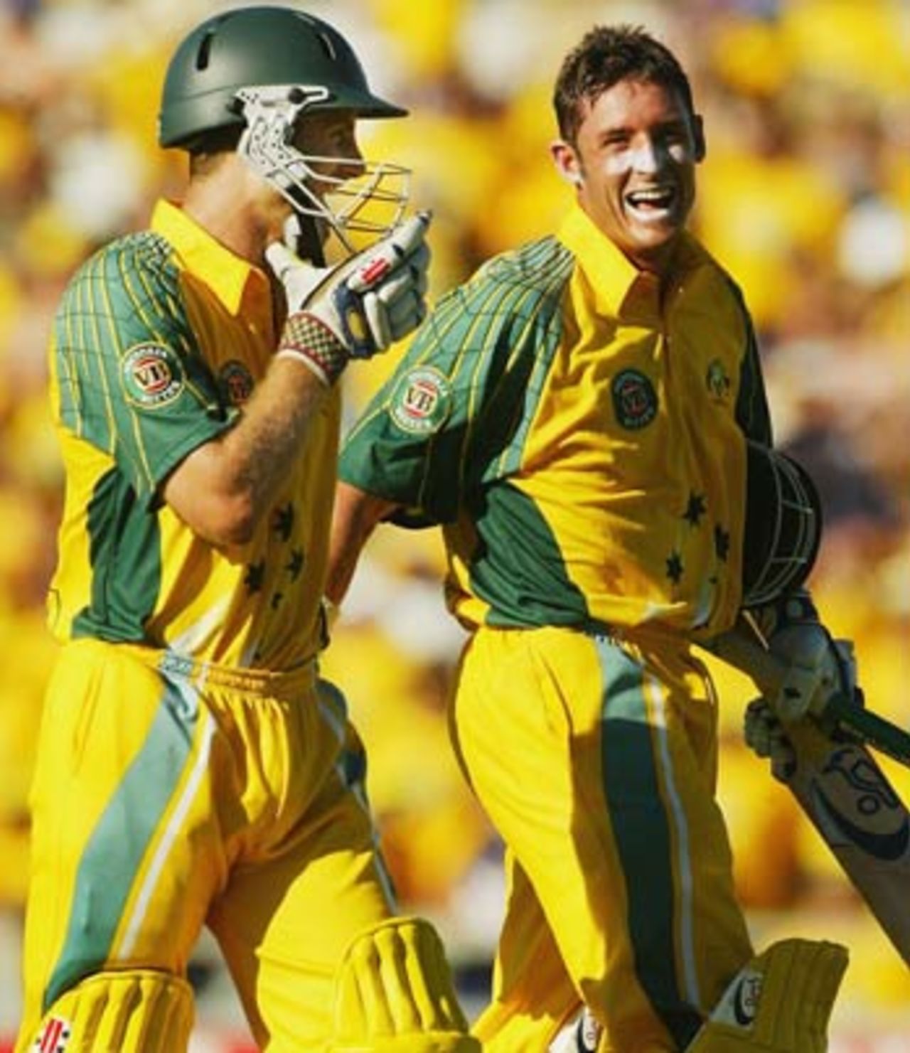Michael Hussey and Simon Katich are all smiles after wrapping up an easy win, Australia v India, 11th match, VB Series, Perth, February 1, 2004
