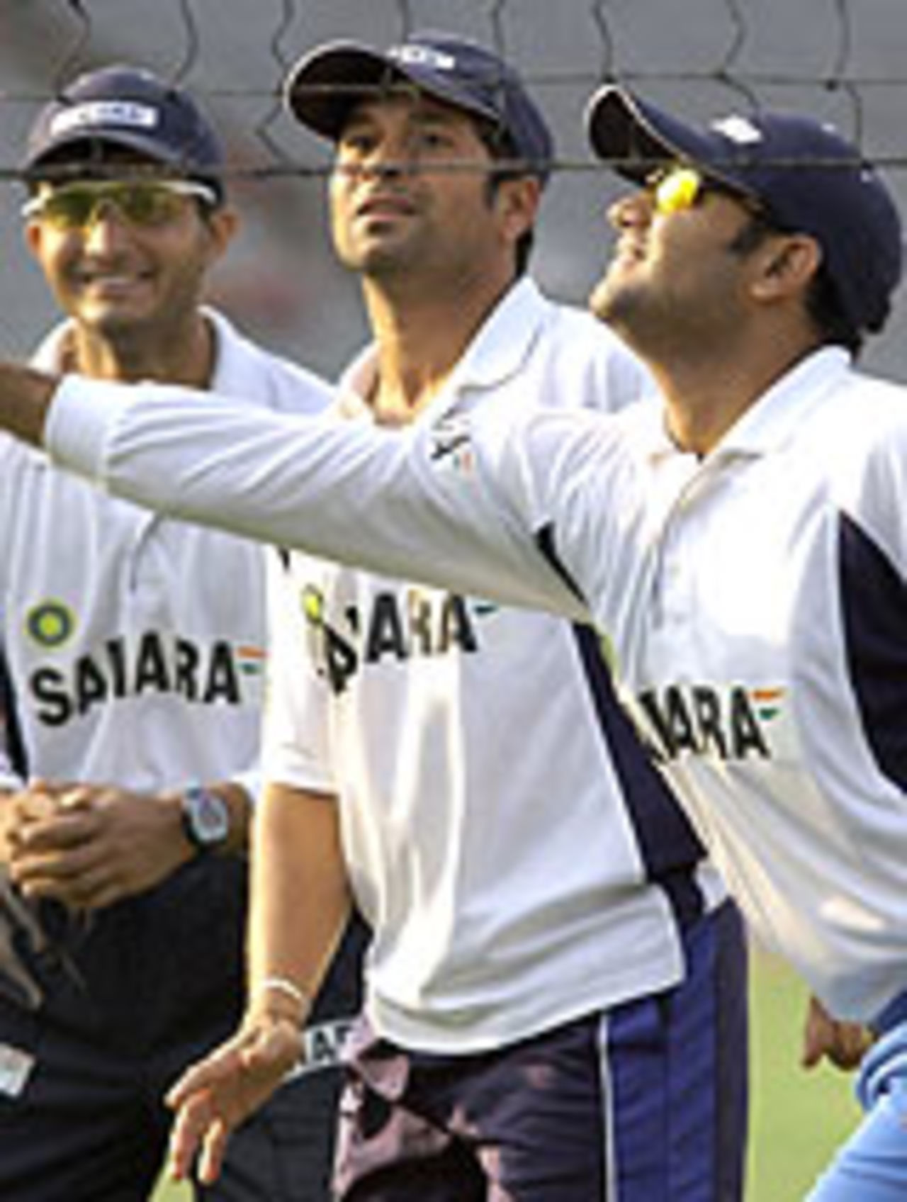 Sachin Tendulkar, Virender Sehwag, and Sourav Ganguly play volleyball