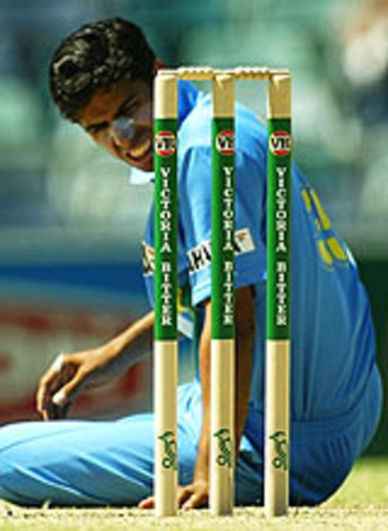 Ashish Nehra on the ground after slipping during his run-up, India v Zimbabwe, 12th ODI, VB Series, Perth, February 3rd, 2004