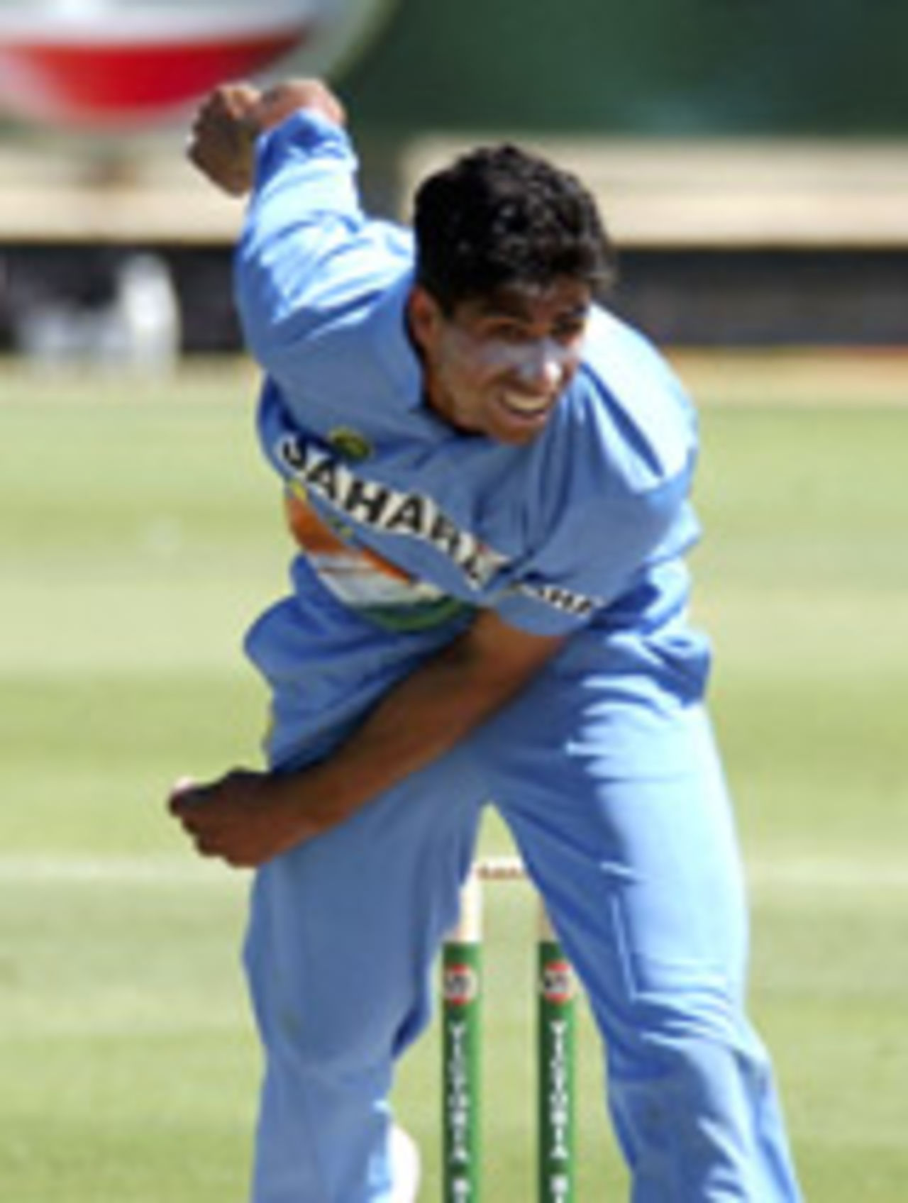 Ashish Nehra delivers the ball, India v Zimbabwe, 12th ODI, VB Series, Perth, February 3rd, 2004