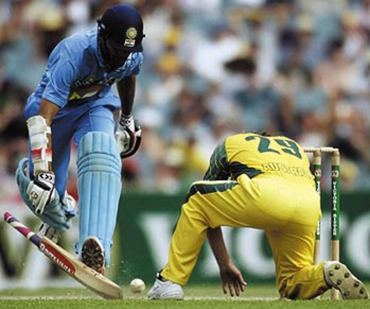 Ian Harvey misses a simple run-out as Hemang Badani makes his ground, Australia v India, VB Series, 1st final, Melbourne, February 6, 2004