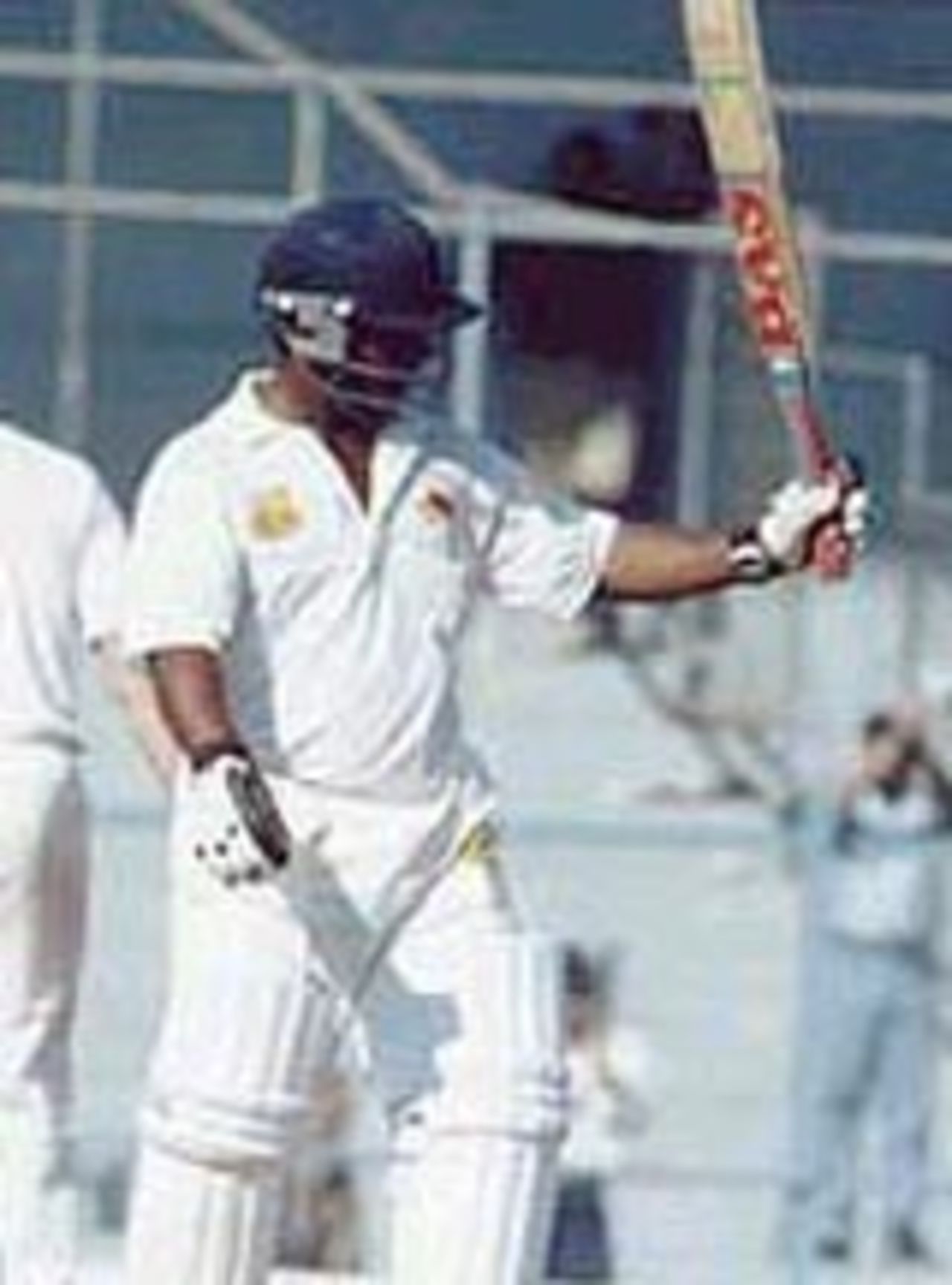 Ramesh Powar acknowledges the cheers on reaching his fifty. Australia in India, 2000/01, Mumbai v Australians, Brabourne Stadium, Mumbai, 22-24 February 2001 (Day 1).
