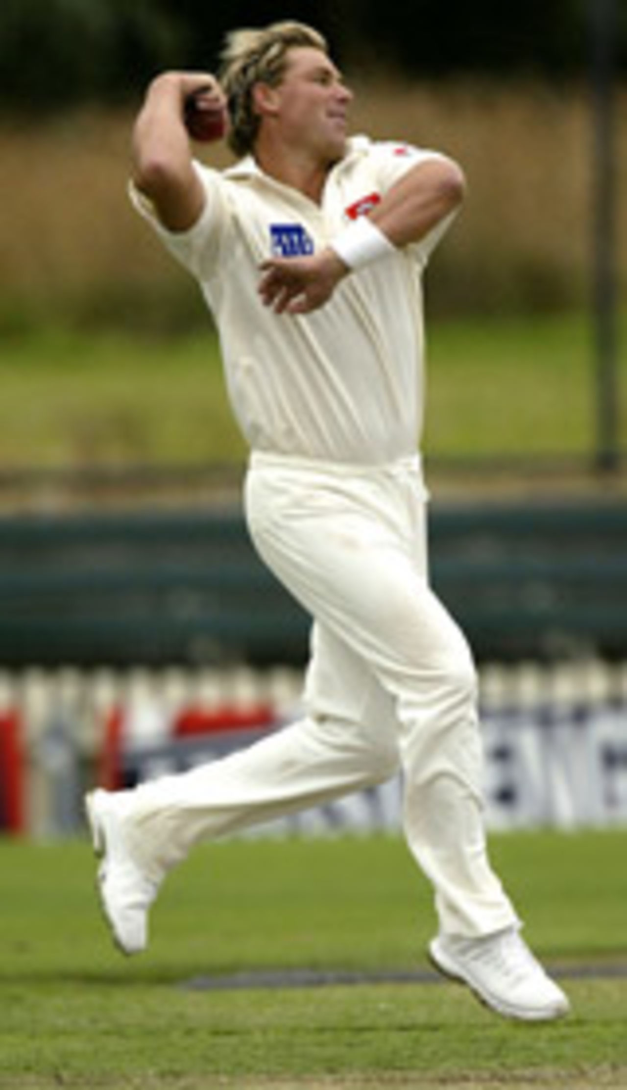 Shane Warne bowls during his celebrated return to cricket