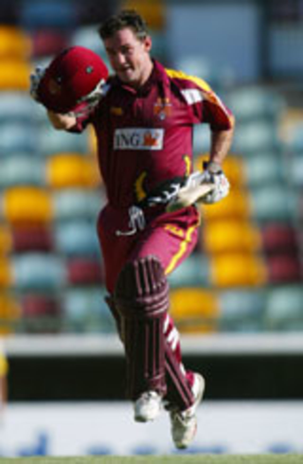 Jimmy Maher jumps for joy after his hundred, Queensland v Western Australia, ING Cup, Gabba, February 13, 2004