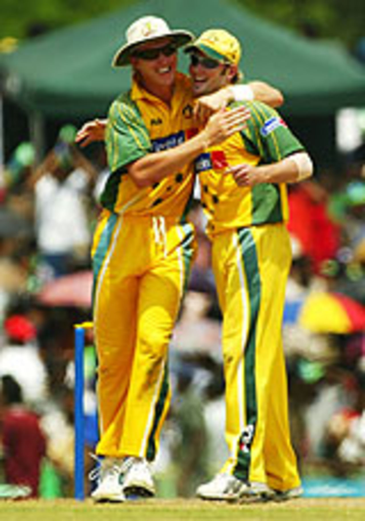 Brett Lee congratulates Michael Clarke on his first five-for, Sri Lanka v Australia, 2nd ODI, Dambulla, February 22, 2004