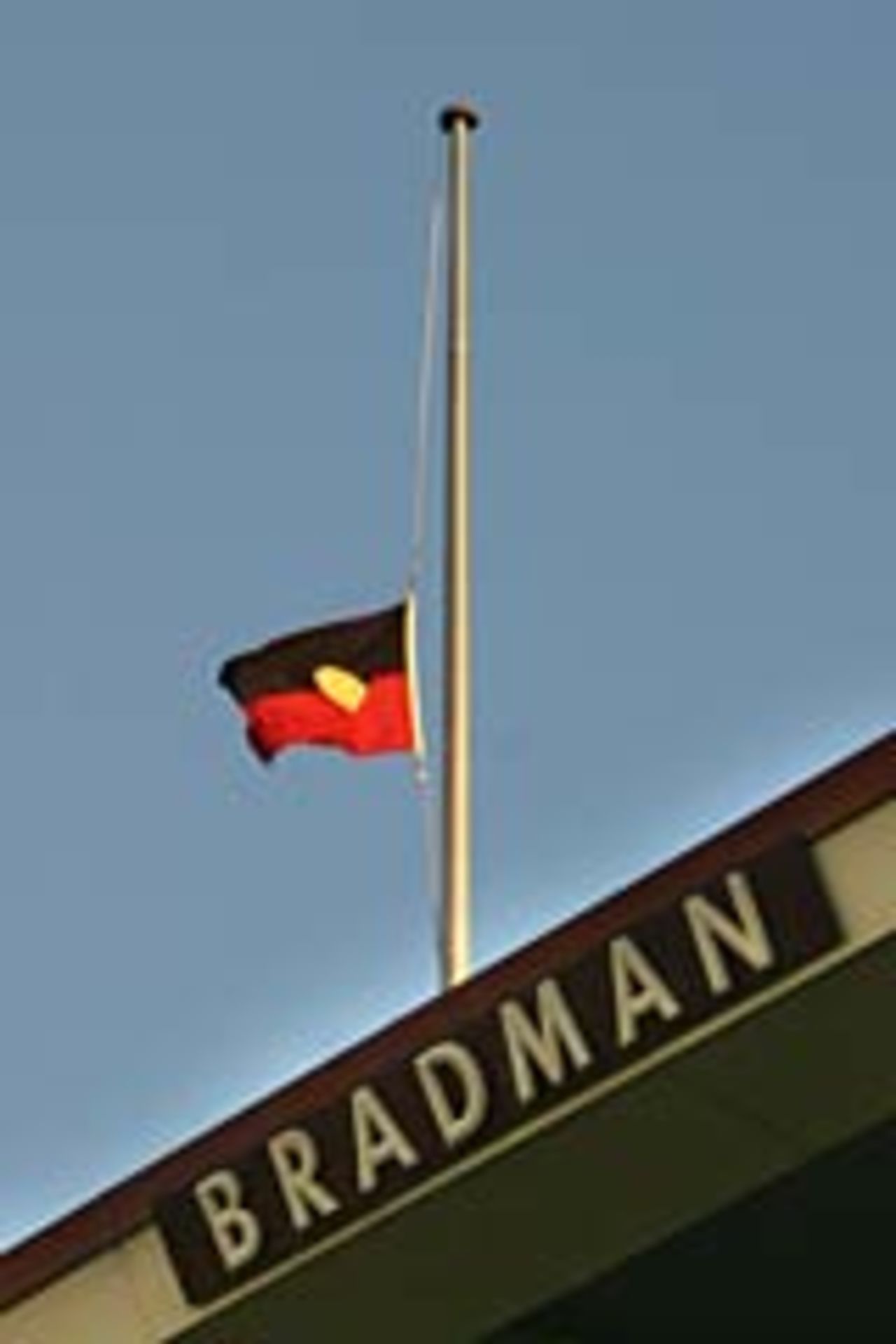 Flag flies at half-mast following the death of Don Bradman, February 2001