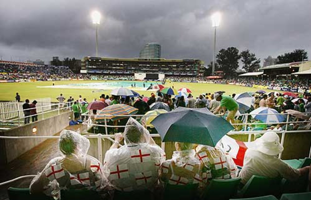 England's fans sit tight and wait for the rain to abate, in the sixth one-day international at Durban, South Africa v England, February 11, 2005