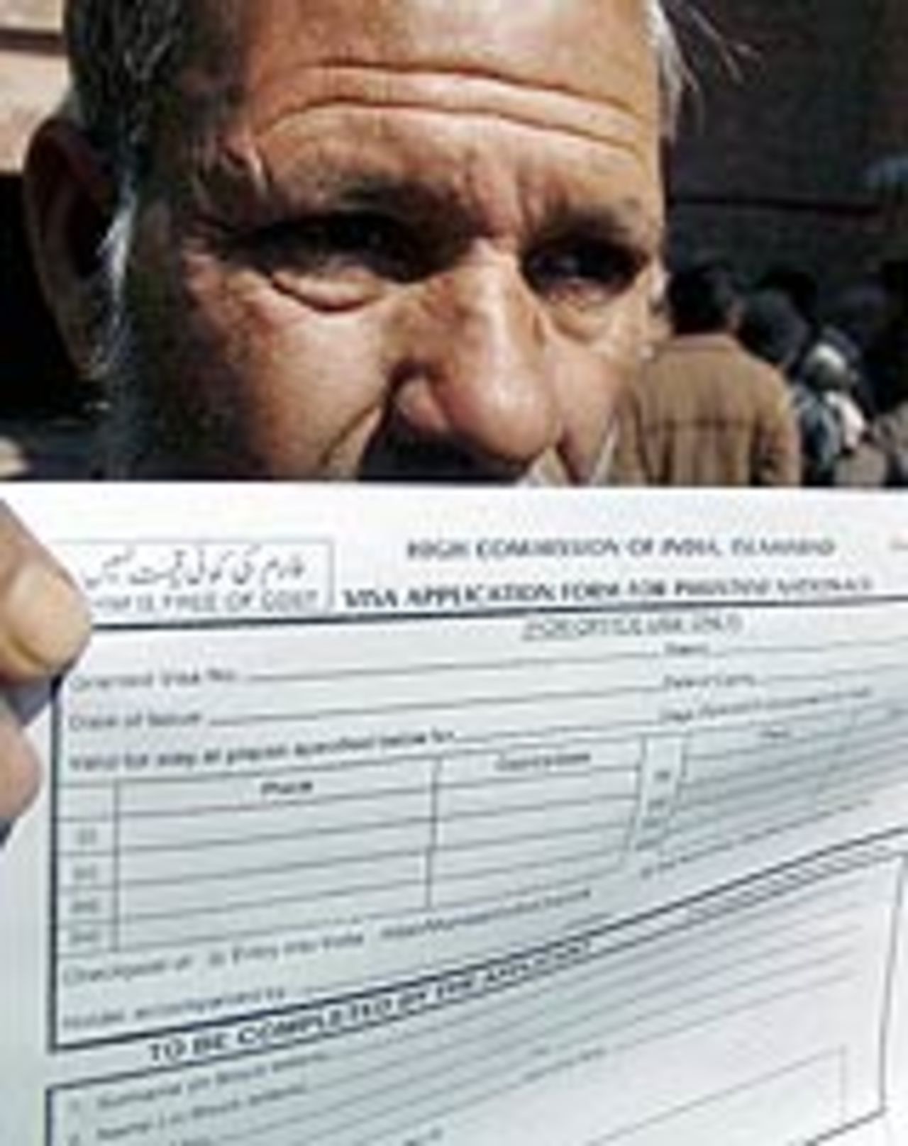 A man outside a visa office in Lahore, February 25, 2005