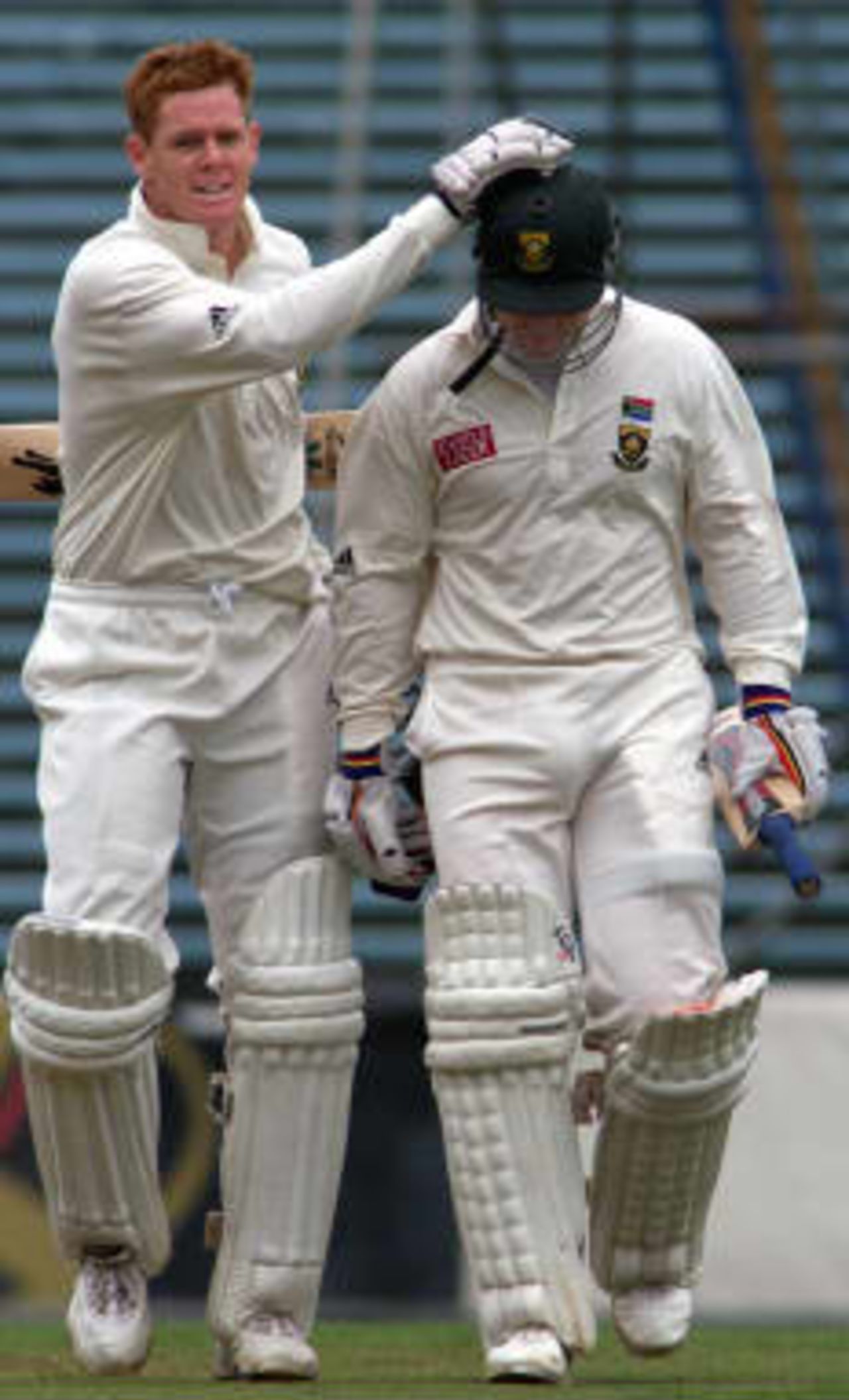 Shaun Pollock congratulates Cullinan after he passes Shaun's Uncle Graeme's record</A> - the South African record for an individual Test score - South Africa in New Zealand, 1998/99, 1st Test, New Zealand v South Africa, Eden Park, Auckland, 1 March