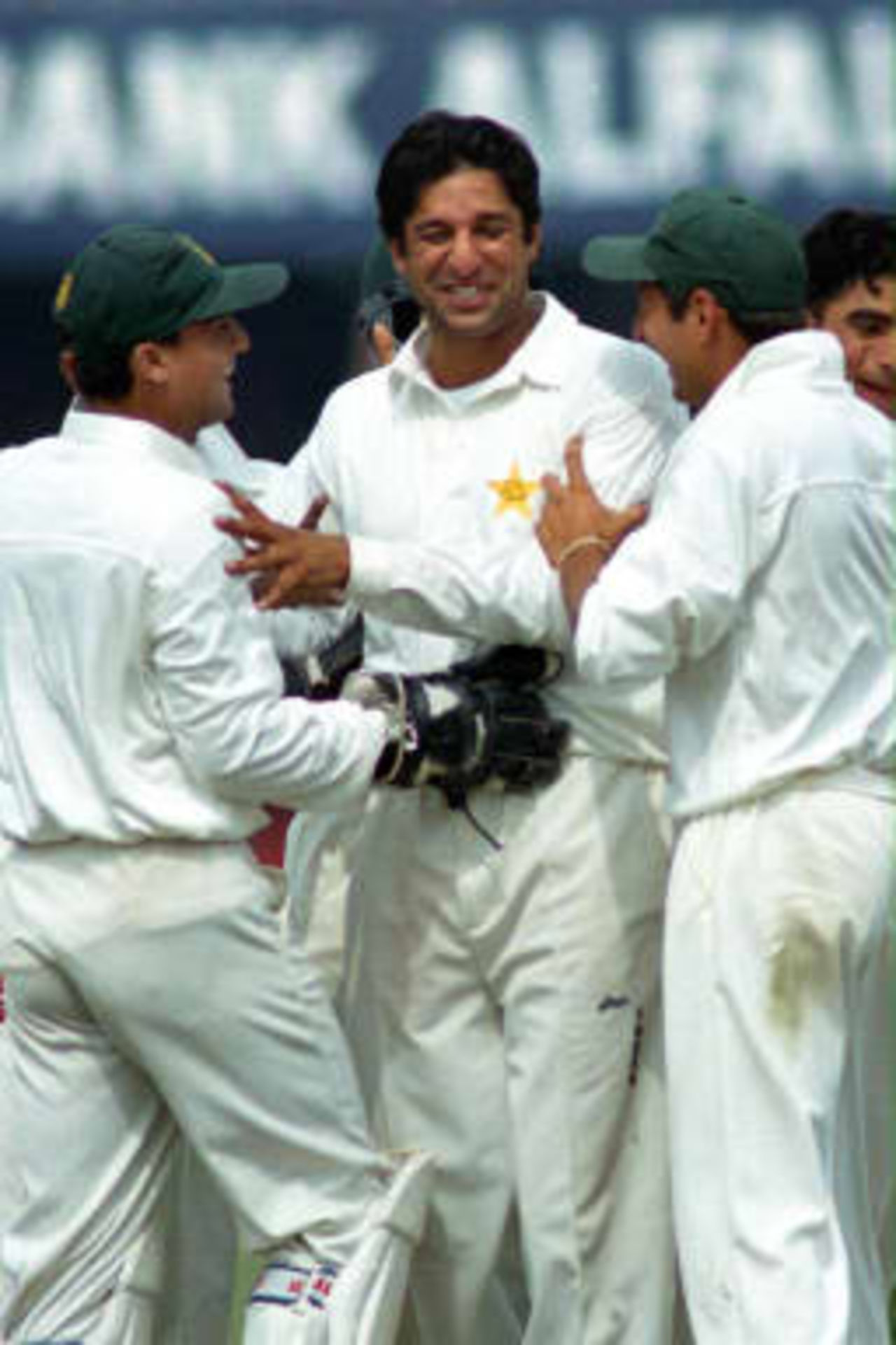 Wasim Akram is congratulated by the team after his hat-trick - Asian Test Championship, 1998/99, 3rd Match, Pakistan v Sri Lanka, Gadaffi Stadium, Lahore, 6 March 1999
