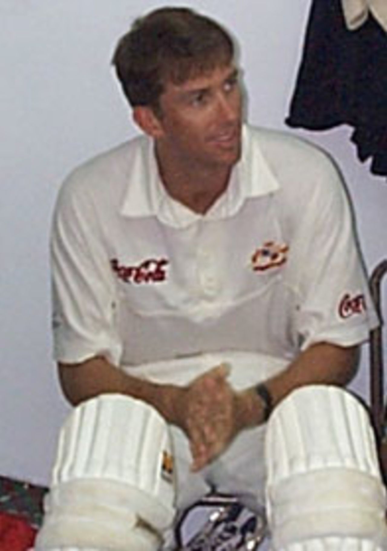 Glenn McGrath sits chatting in the dressing room after making his Highest test score of 39 during the West Indies v Australia test at Queens Park Oval, Port-of-Spain, Trinidad. March 6, 1999.