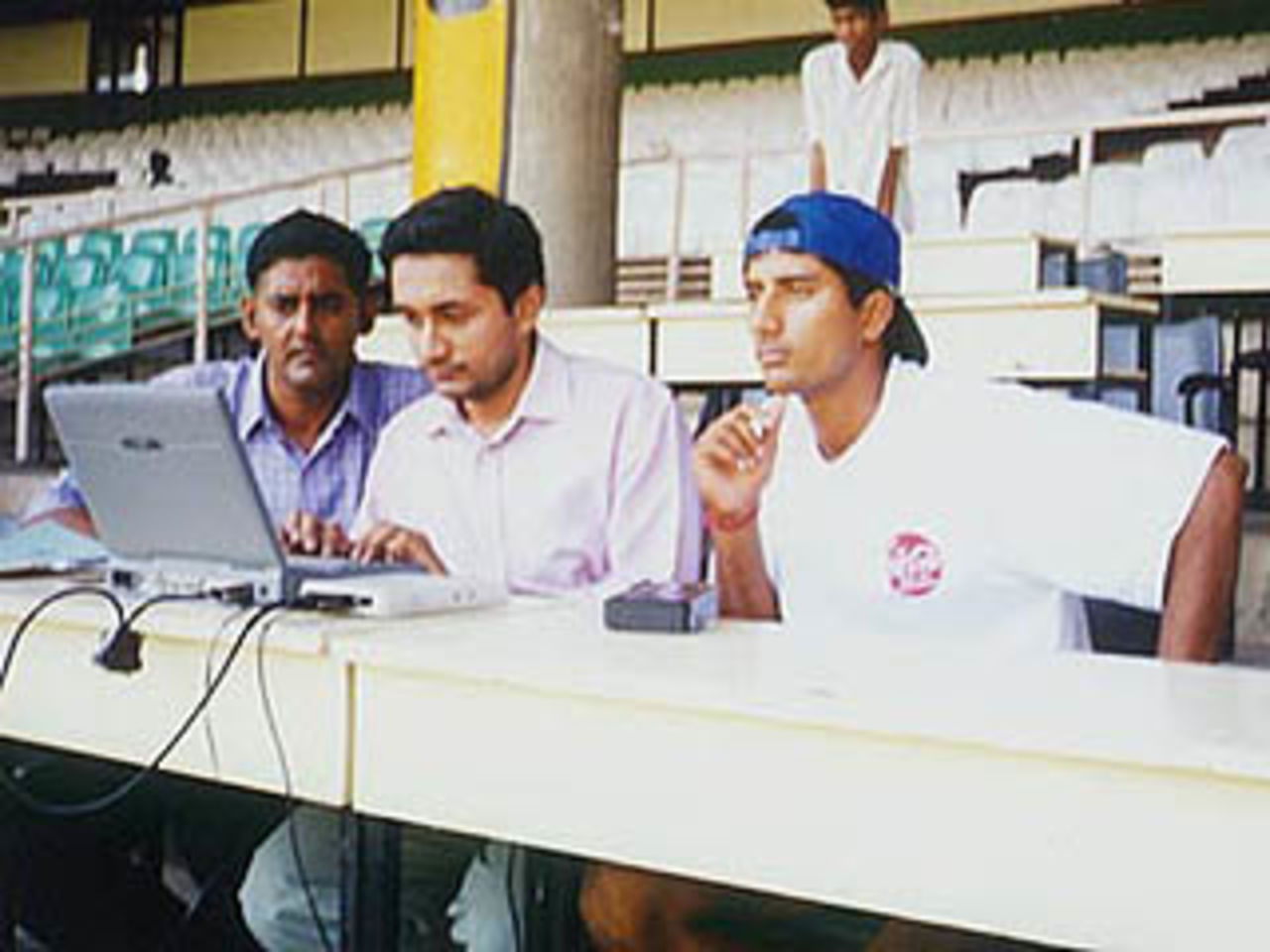 Sadagopan Ramesh watches the proceedings of the Tamil Nadu-Orissa Ranji Trophy Superleague match at the MAC Stadium, Chepauk during the interview.