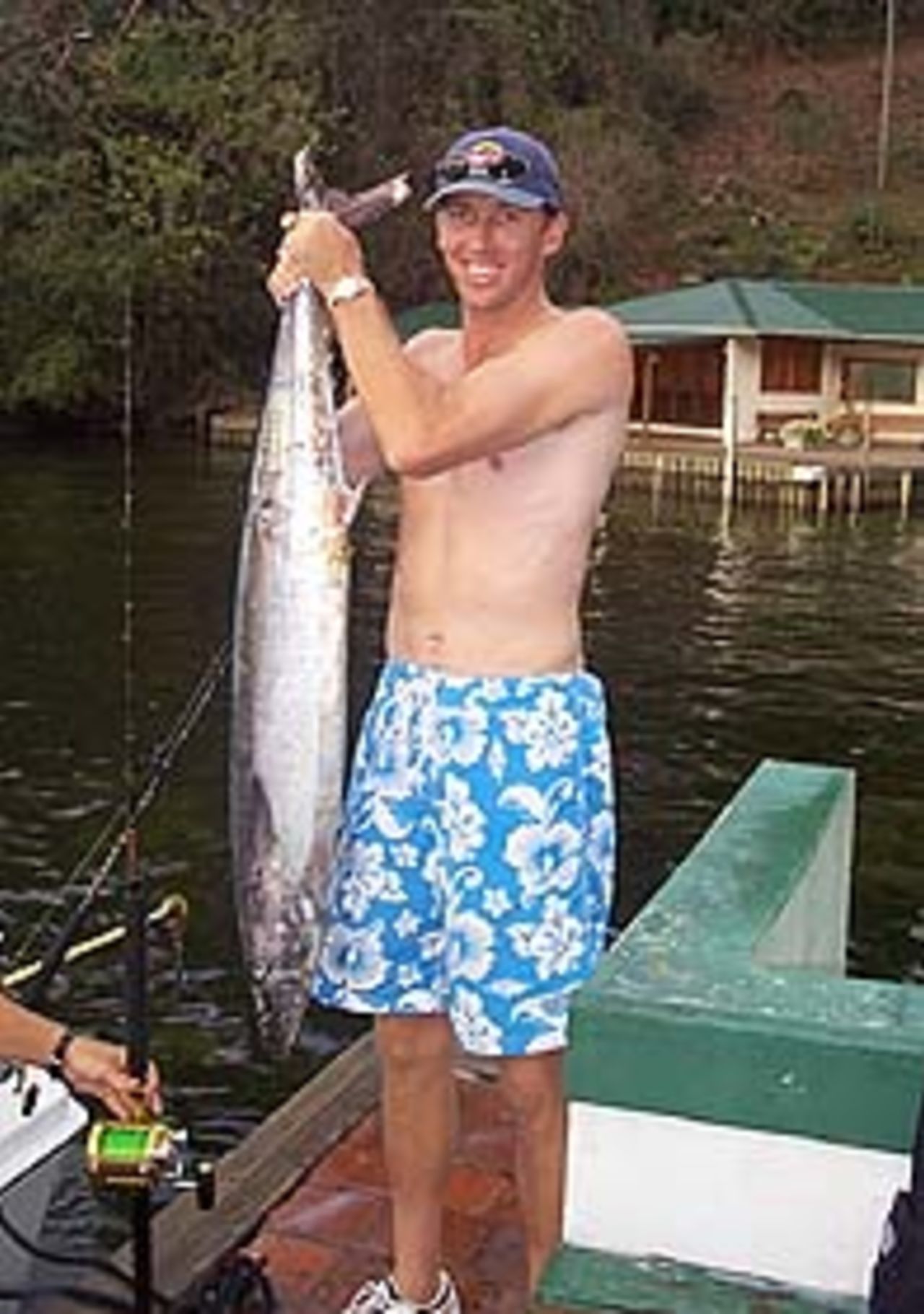 Glenn McGrath shows off his catch after a fishing trip in Trinidad. March 10, 1999