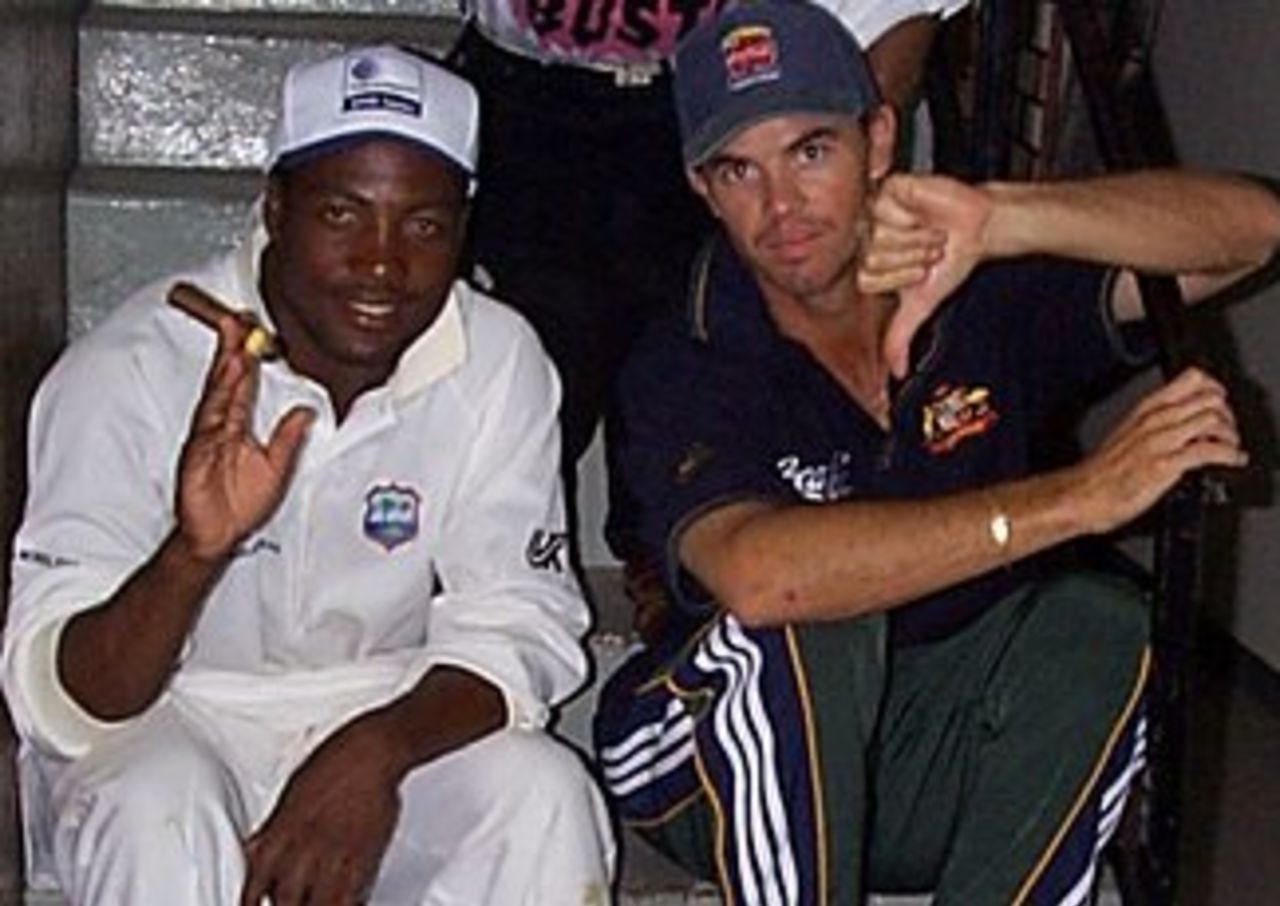 Brian Lara and Greg Blewett after the West Indies won the second Test against Australia in Jamaica. March 16, 1999.