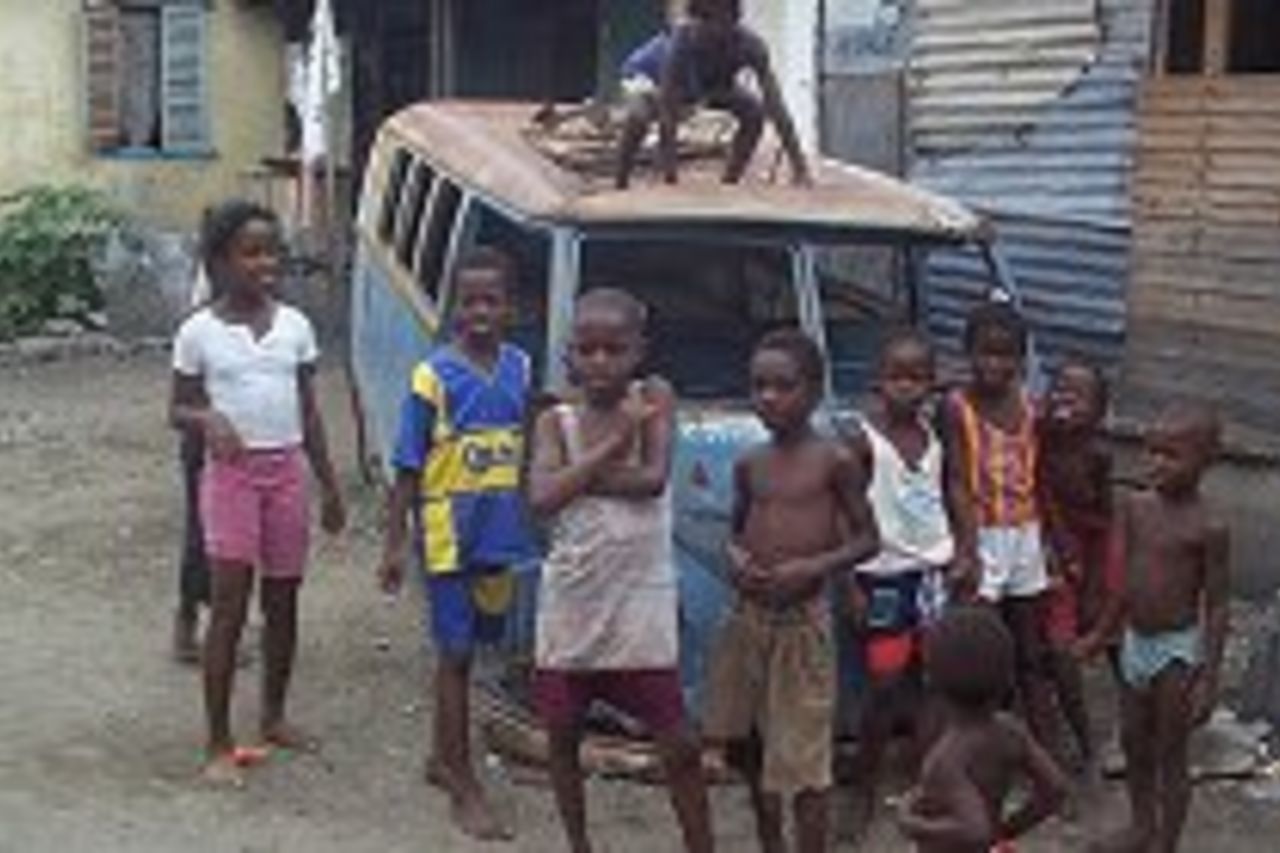 Kids in the backyard of Bob Marley's first house. March 18, 1999.