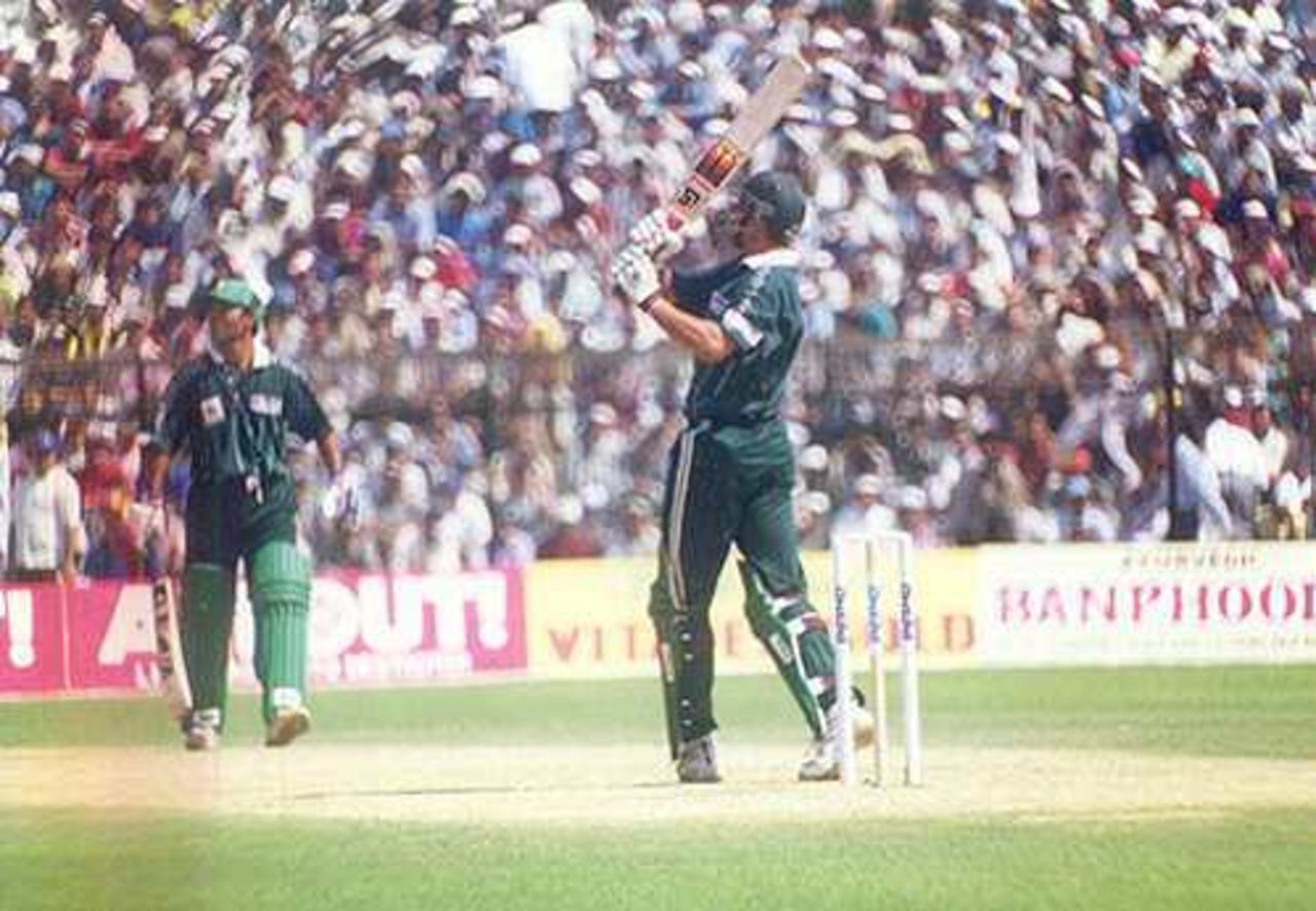 Shahid Afridi pulls through the legside as Saeed Anwar looks on, Pepsi Cup, Keenan Stadium, Jamshedpur, 19 March 1999