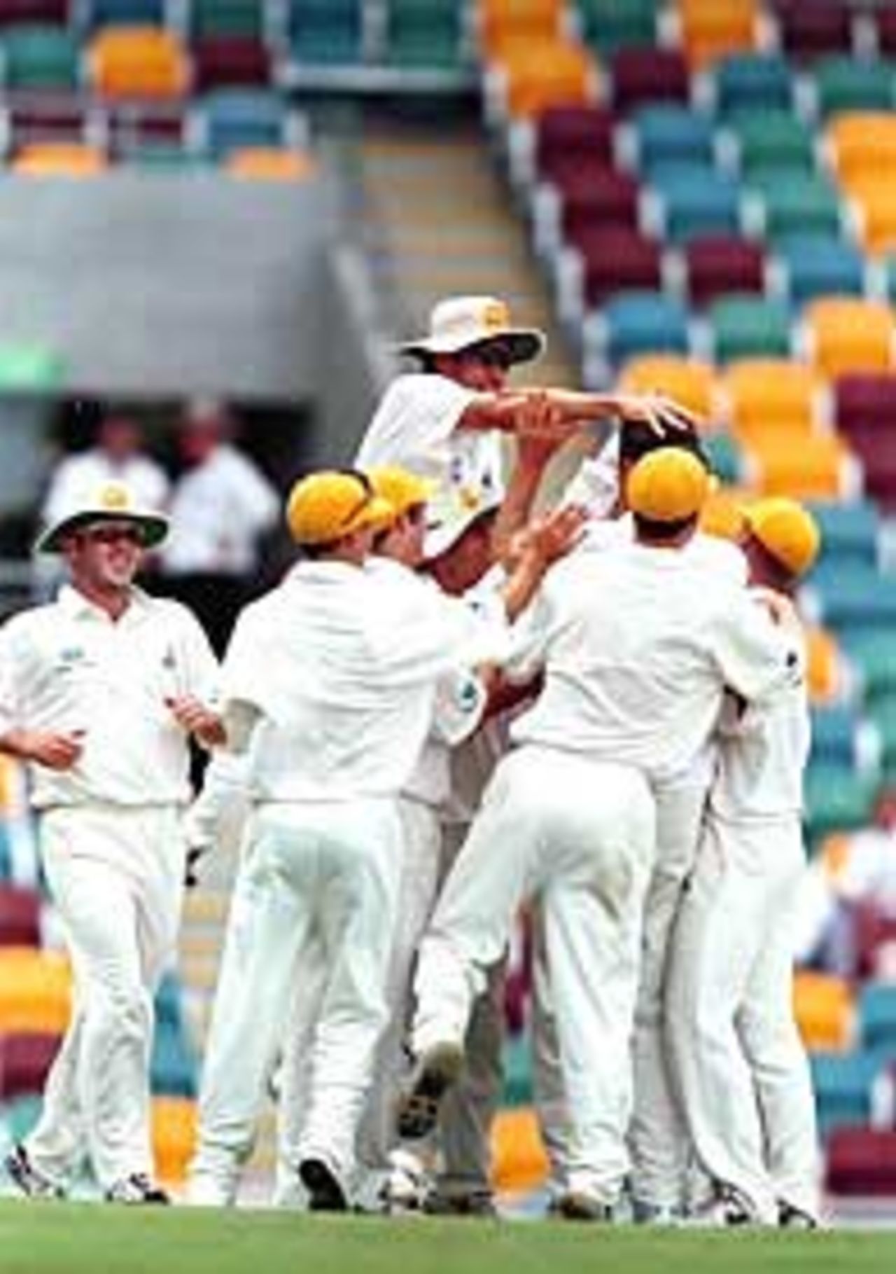 The Western Australia players celebrate their innings victory over Queensland in the 1998/99 Sheffield Shield Final at the 'gabba. March 22, 1999.