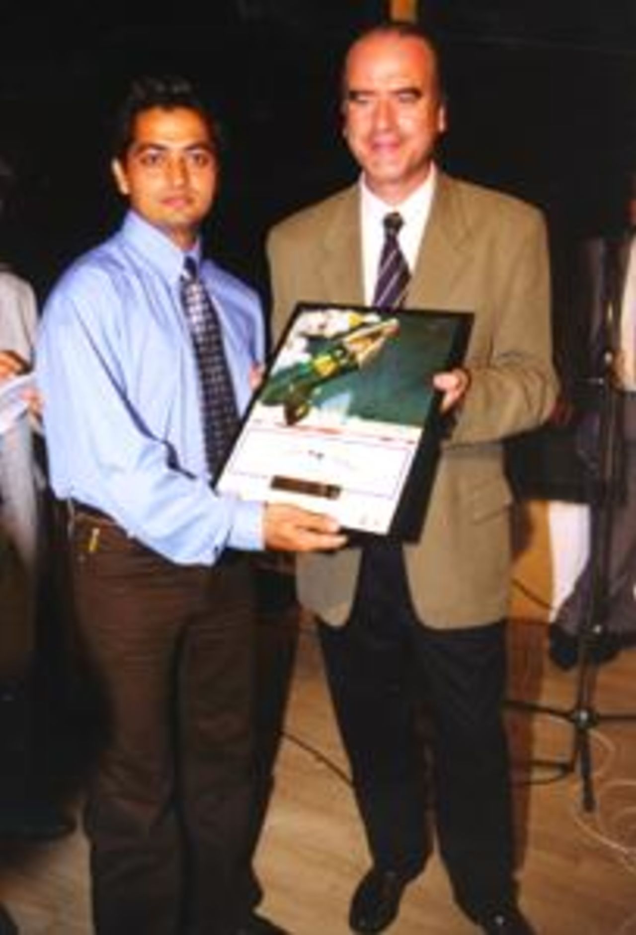 Tim Lamb of ECB makes a presentation to the winning Dutch captain at the 1999 European Under 17 Championships