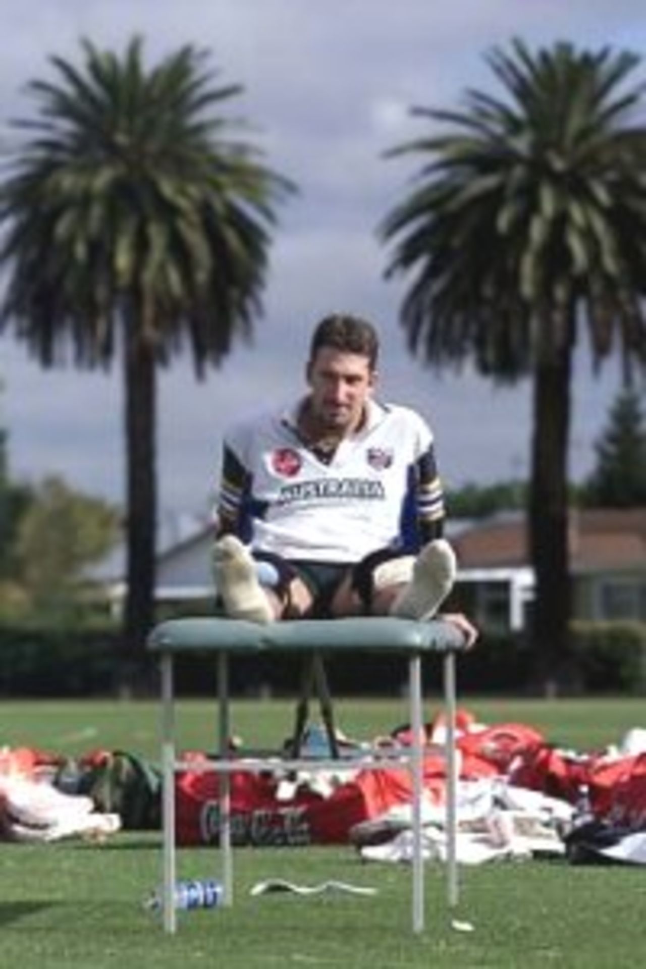 17 Mar 2000: Damien Fleming of Australia sitting on the Physio table during training at Nelson Park, Napier, New Zealand.
