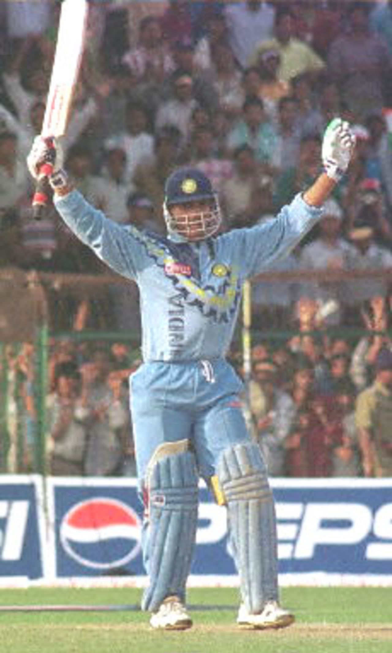 Indian skipper Sourav Ganguly waves his bat to the spectators after scoring his century during the second match of the one day series against South Africa at Keenam Stadum, Jamshedpur, 12 March 2000. India won the match by seven wickets. Sourav Ganguly scored a century and became man of the match