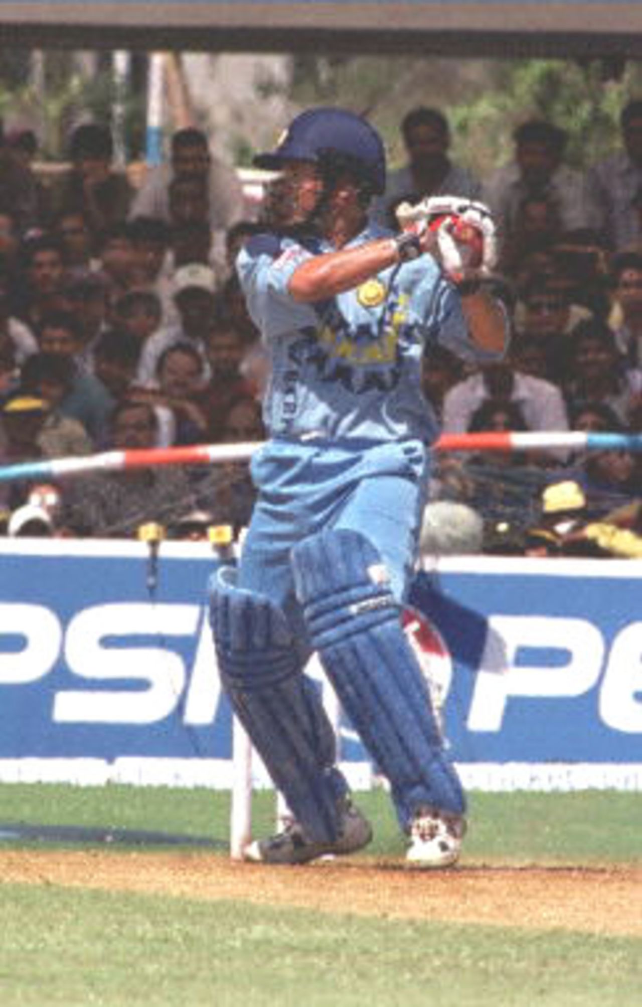 Indian master blaster batsmen Sachin Tendulkar squares Jacques Kallis to the fence as he chips-in 122 runs, 17 March 2000 that brought India victory over South Africa at the IPCL stadium in Baroda. Tendulkar grabbed his 25th one-day century as India won the fourth of their five-math series against South Africa to take an unbeatable 3-1 lead