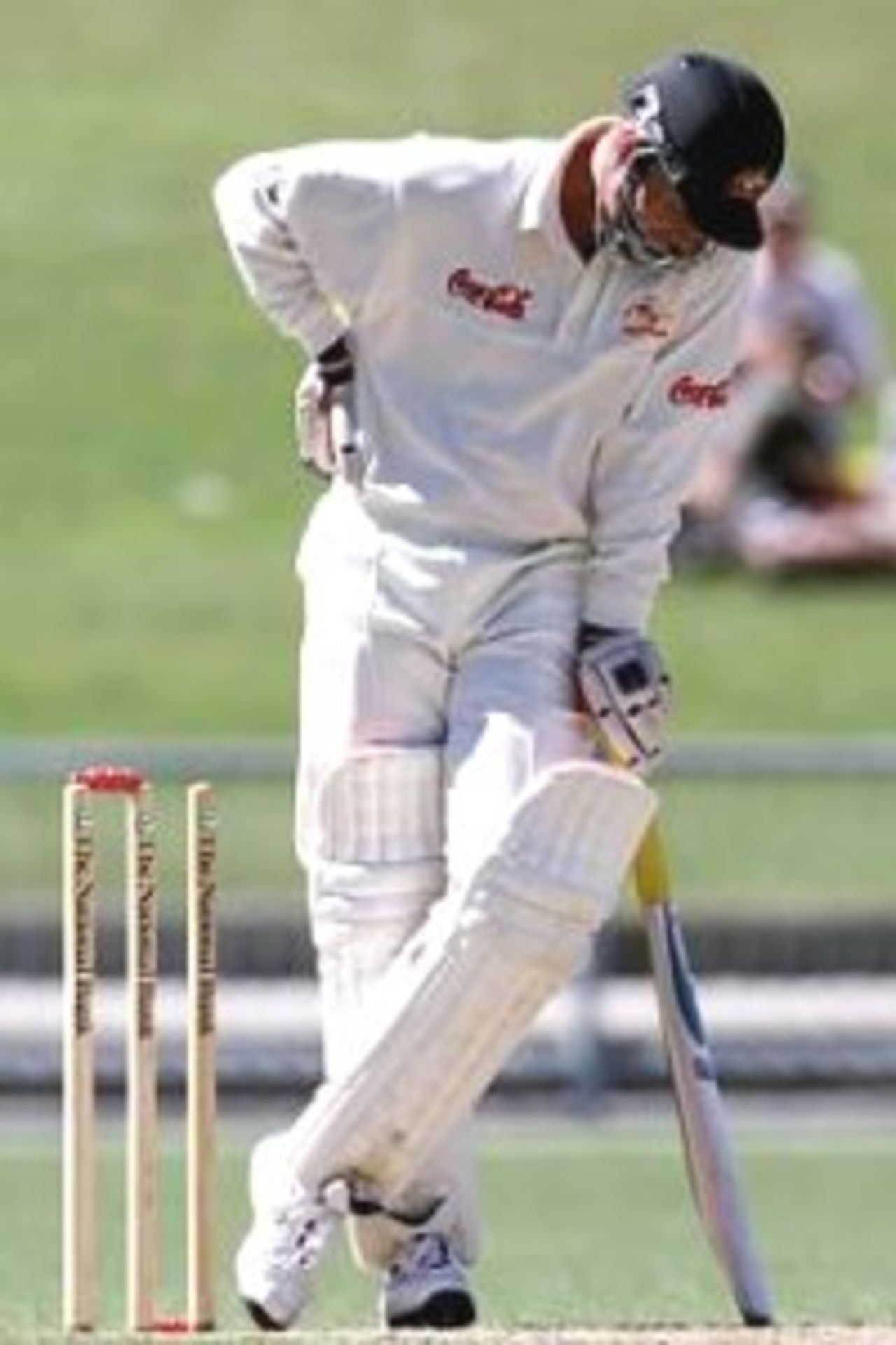 19 Mar 2000: Colin Miller of Australia can't believe his bad luck after being bowled by a ball that hit his bat then his foot before hitting the stumps, he was out for a first ball duck, during day two of the tour game between Central Districts and Australia at McLean Park, Napier, New Zealand.