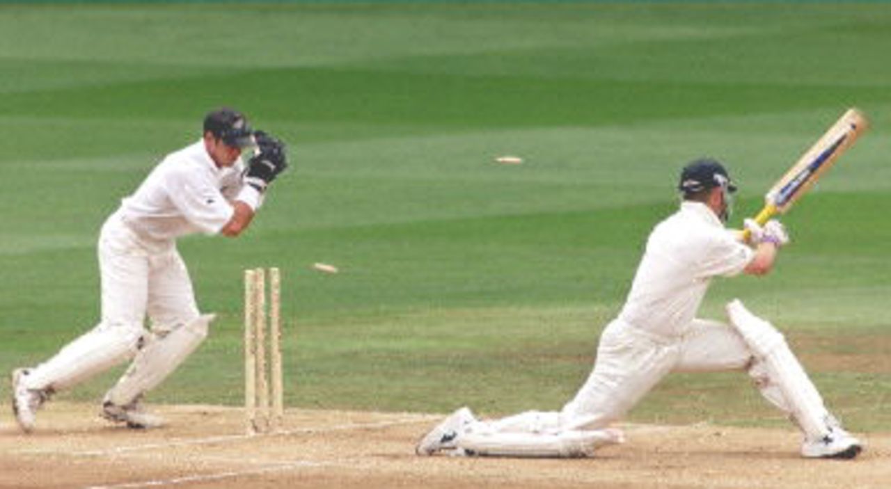 New Zealand wicketkeeper Adam Parore (L) stumps Australia batsman Colin Miller (R) on the third day of the first Test Match being played at Eden Park in Auckland, 13 March 2000. After dismissing Australia for 229 in their second innings, New Zealand, who is chasing 281 runs for victory are 151-5 at stumps.