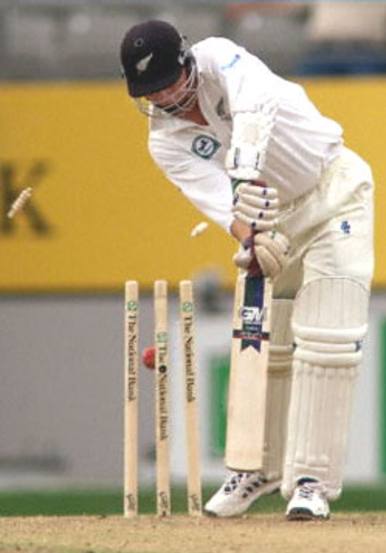 New Zealand night watchman Paul Wiseman is cleaned bowled on the last ball of the day by Australian speedster Brett Lee on the first day of the first Test Match at Eden Park in Auckland 11 March 2000. Australia was dismissed for 214 in their first innings and in reply New Zealand is in trouble at 25-4 at stumps.