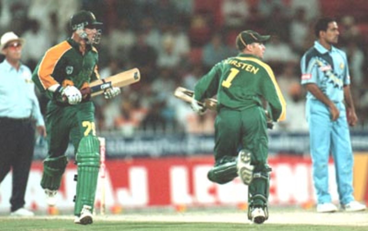 Gibbs and Kirsten watch the ball race towards the fence, India v South Africa, Coca-Cola Cup, 1999/00, C.A. Stadium Sharjah, 22 March 2000