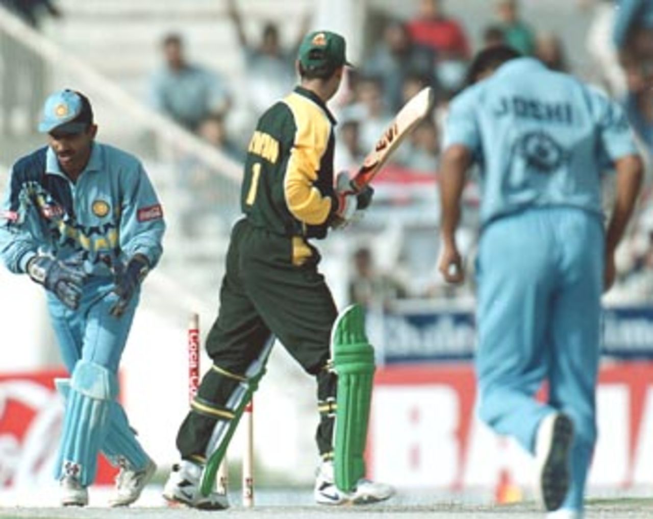 Imran Nazir looks down at the stumps after being bowled by Joshi India v Pakistan, Coca-Cola Cup, 1999/00, Sharjah C.A. Stadium, 23 March 2000