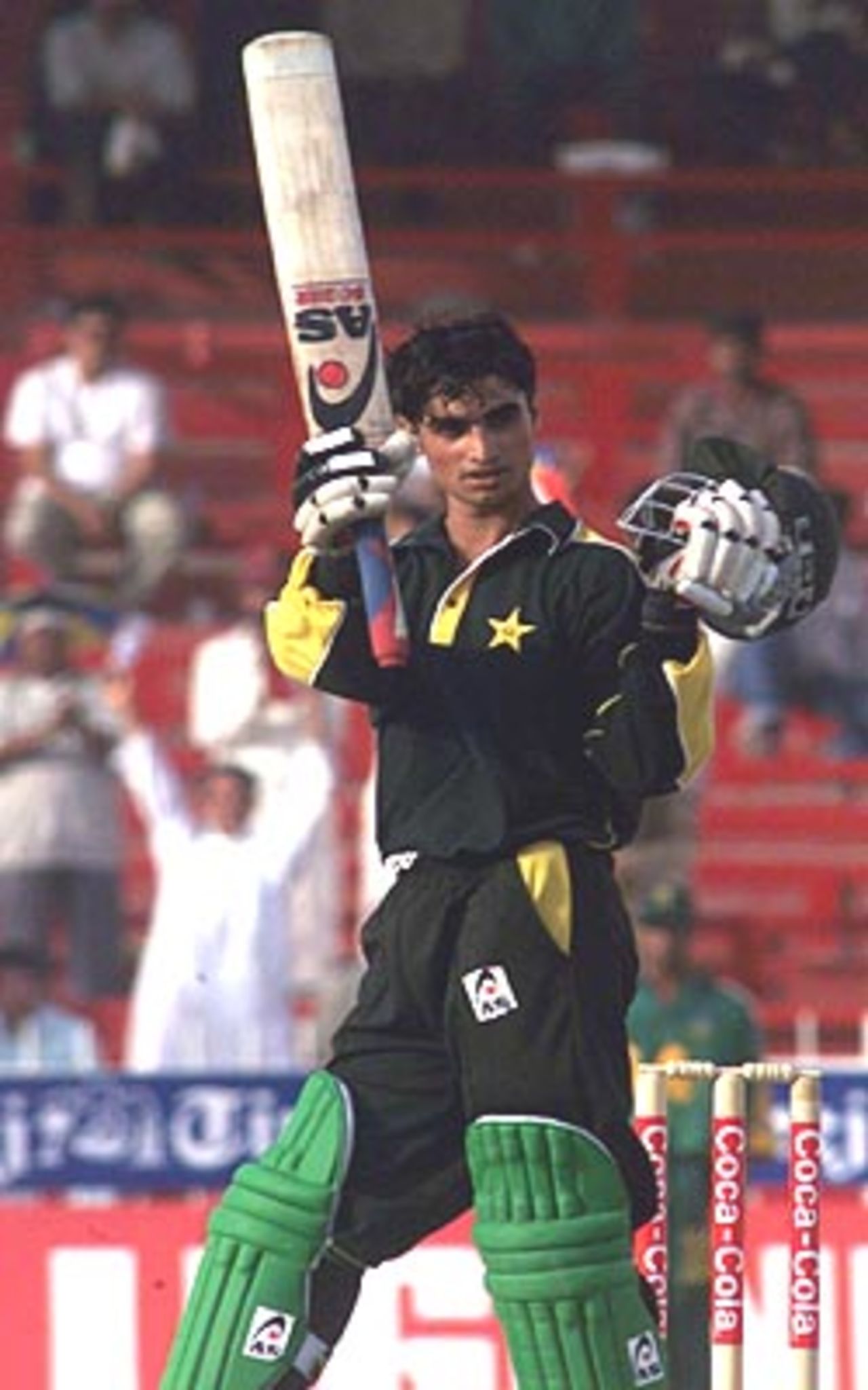 Imran Nazir waves to the crowds after reaching the half-century mark, Pakistan v South Africa, Coca-Cola Cup 1999/00, C.A. Stadium Sharjah, 24 March 2000.