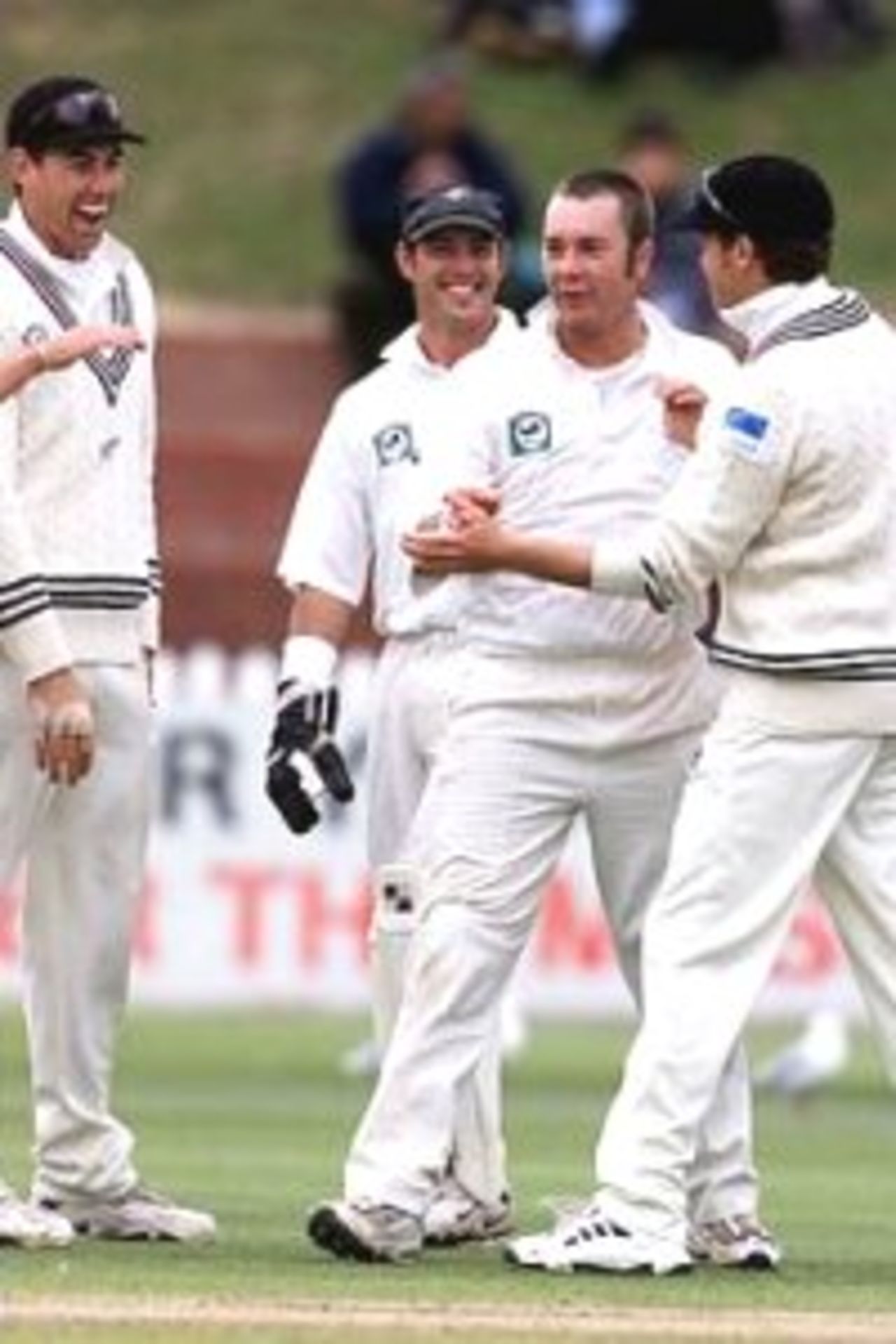 26 Mar 2000: Craig McMillan of New Zealand celebrates with team mates after taking the wicket of Colin Miller of Australia, during day three of the second test between New Zealand and Australia at the Basin Reserve, Wellington, New Zealand.