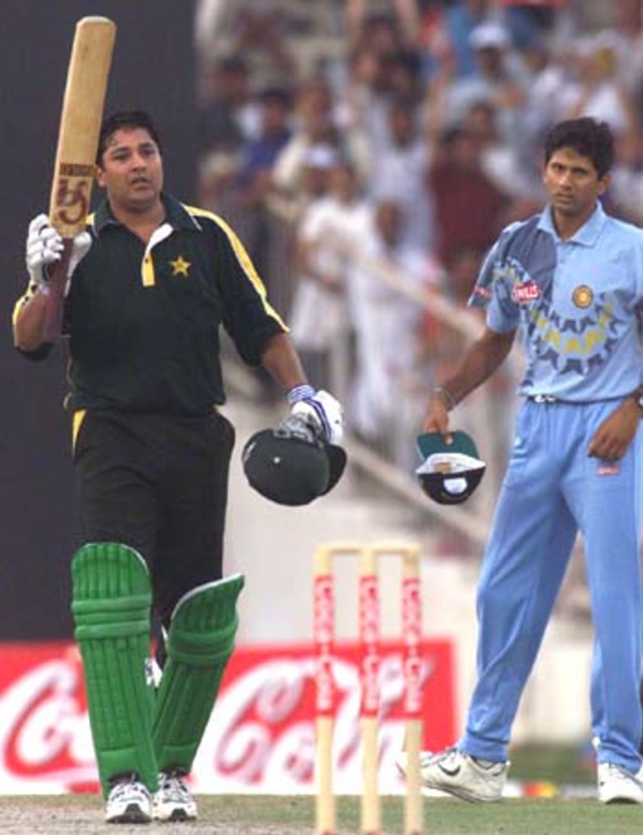 Inzamam-ul-Haq waves to the crowds after reaching the three figure mark, India v Pakistan, Coca-Cola Cup 1999/00, Sharjah C.A. Stadium, 26 March 2000.