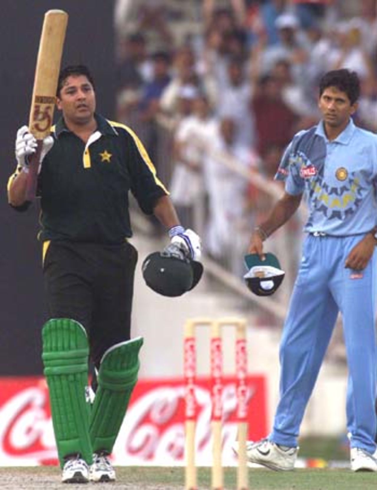 Inzamam-ul-Haq waves to the  crowds after reaching the three figure mark, India v Pakistan, Coca-Cola Cup 1999/00, Sharjah C.A. Stadium, 26 March 2000.