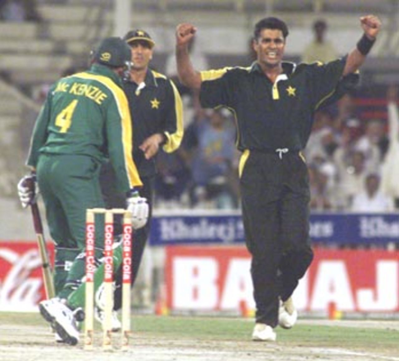 Waqar Younis celebrates after trapping McKenzie leg before wicket, Pakistan v South Africa, Coca-Cola Cup 1999/00, Sharjah C.A. Stadium, 28 March 2000.