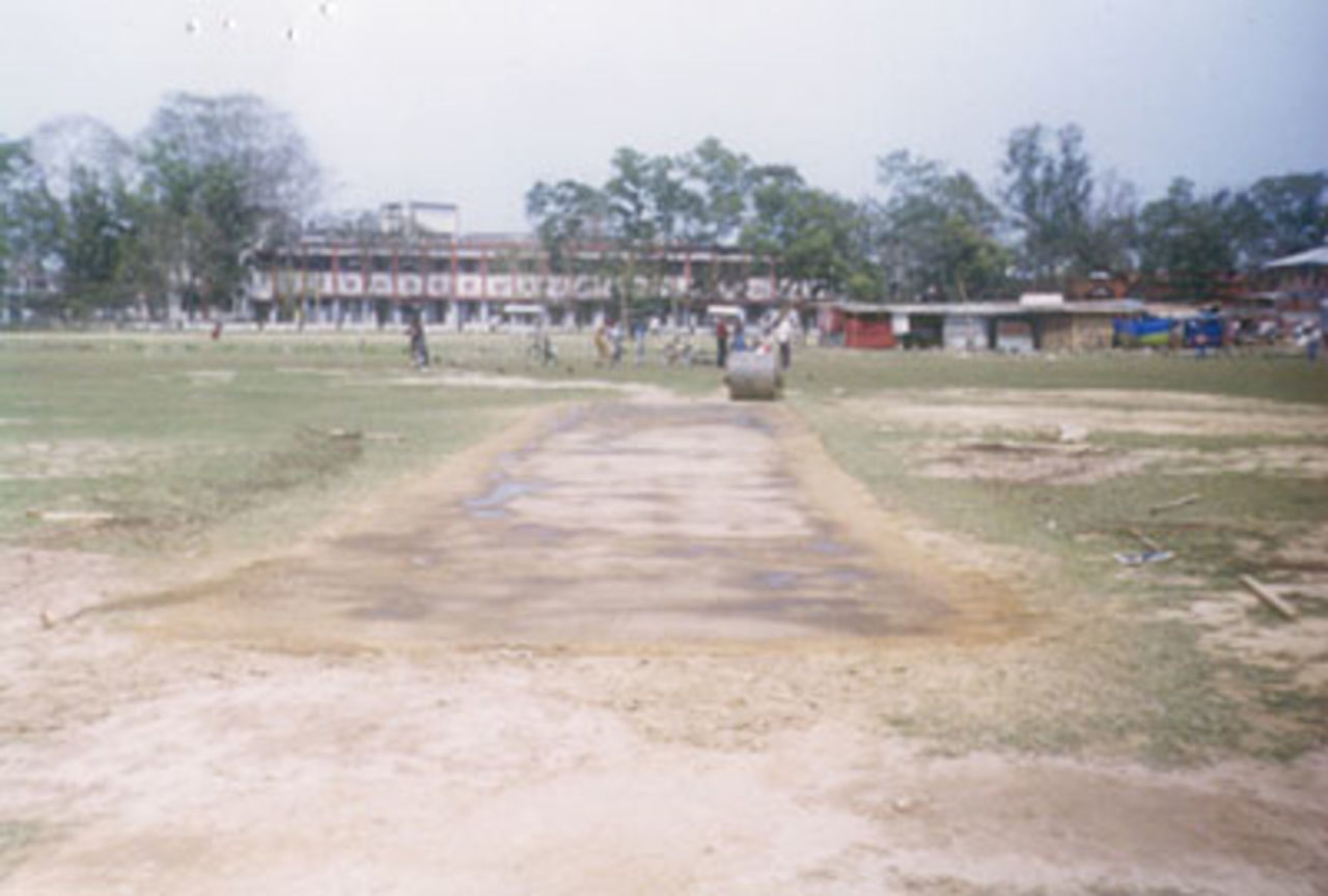 Pitch curators at work at the Jorhat District Sports Associtation Ground