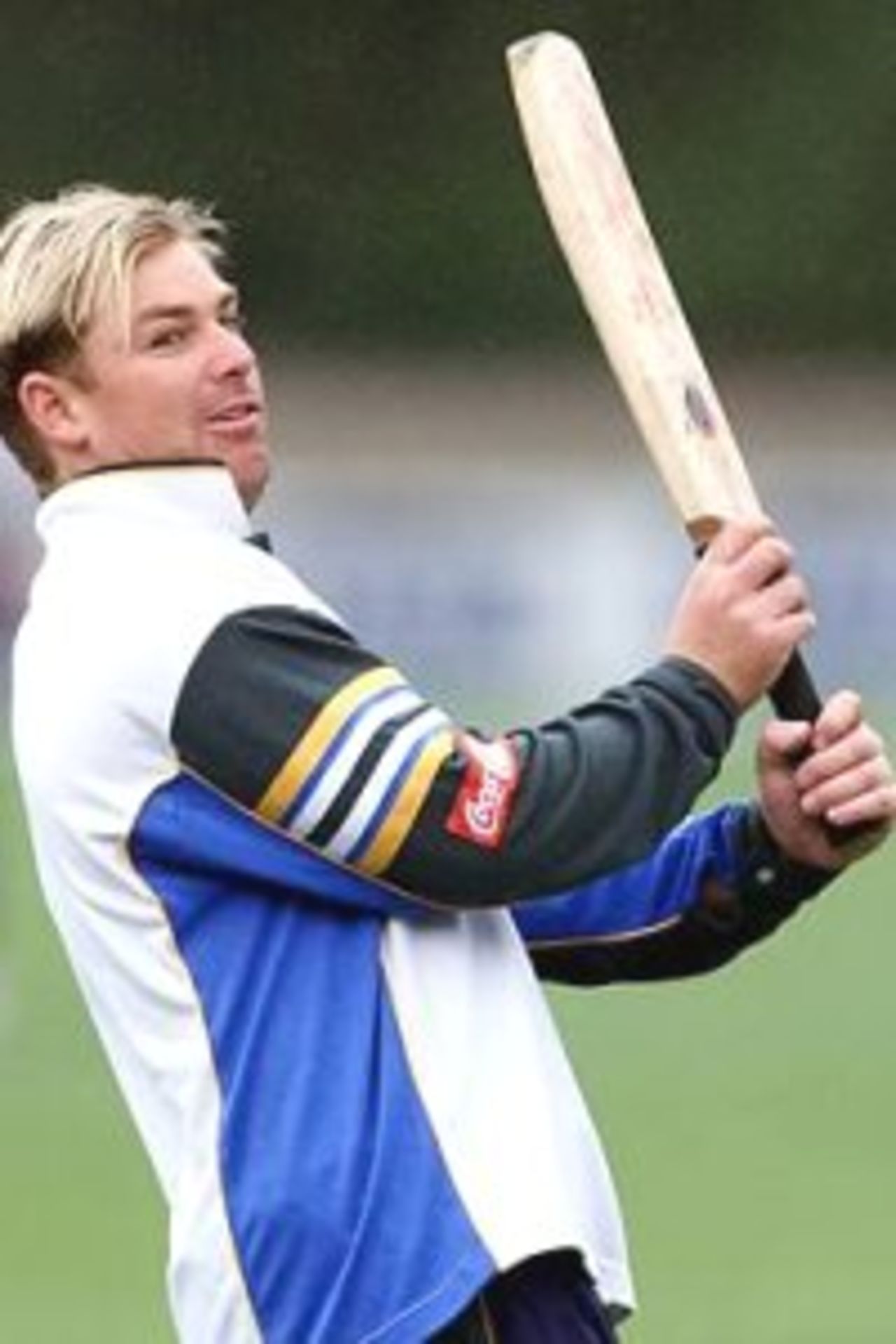 30 Mar 2000: Shane Warne of Australia, hitting some catches, during training at WestpacTrust Park, Hamilton, New Zealand.