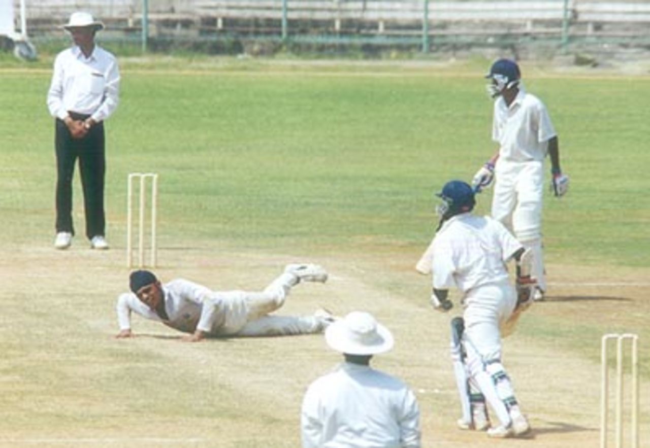 RS Sodhi dives in vain to stop Sriram's straight drive, Tamil Nadu v Punjab, Ranji Trophy 1999/00, 2nd Quarter-Final, MA Chidambaram Stadium Chepauk, Chennai, 30 March-3 April 2000.