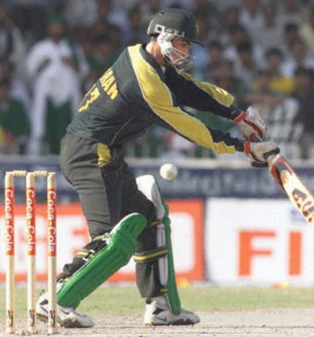 Pakistani batsman Imran Nazir plays and misses at a ball from South African bowler Steve Elworthy during the three-nation cricket Sharjah Cup final in Sharjah 31 March 2000