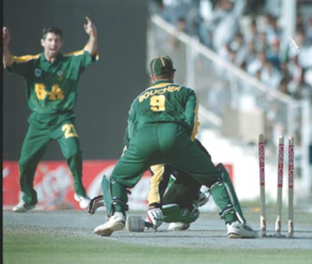 Crookes leaps in joy after having Imran Nazir stumped by Mark Boucher, Pakistan v South Africa, Coca-Cola Cup 1999/00, Final, Sharjah C.A. Stadium, 31 March 2000.