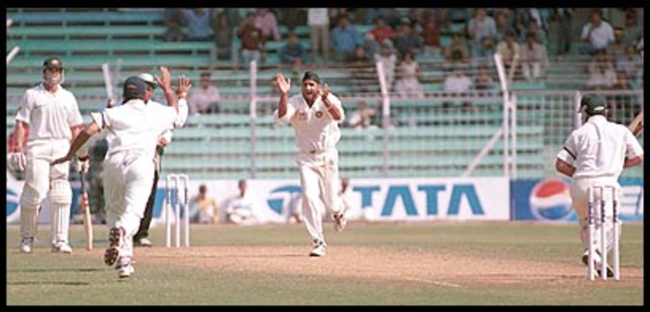 An ecstatic Harbhajan after Ponting is consumed at short leg. Australia in India 2000/01, 1st Test India v Australia, Wankhede Stadium, Mumbai, 27Feb-03Mar 2001 (Day 2)