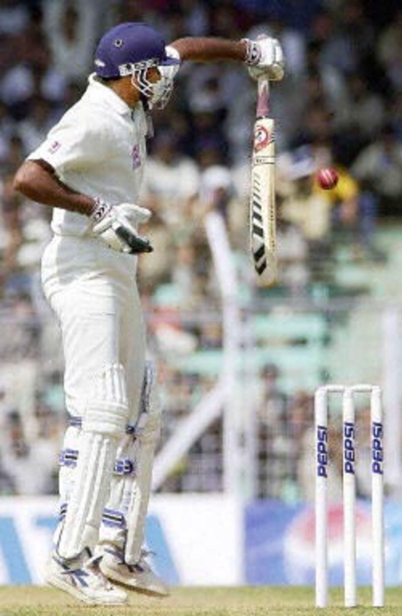 India tailender Javagal Srinath plays a delivery from Australian pace bowler Glenn McGarth with one hand during the third day's play of the first Test match between India and Australia at the Wankhede stadium in Bombay 01 March 2001. India collapsed at 219 in their second innings and face an almost certain defeat.