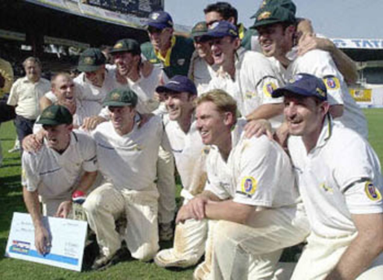 The Australian cricket team poses for a group photograph after the prize distribution at the end of the first test match between India and Australia at the Wankhade Stadium in Bombay 01 March 2001. Australia beat India by 10 wickets.