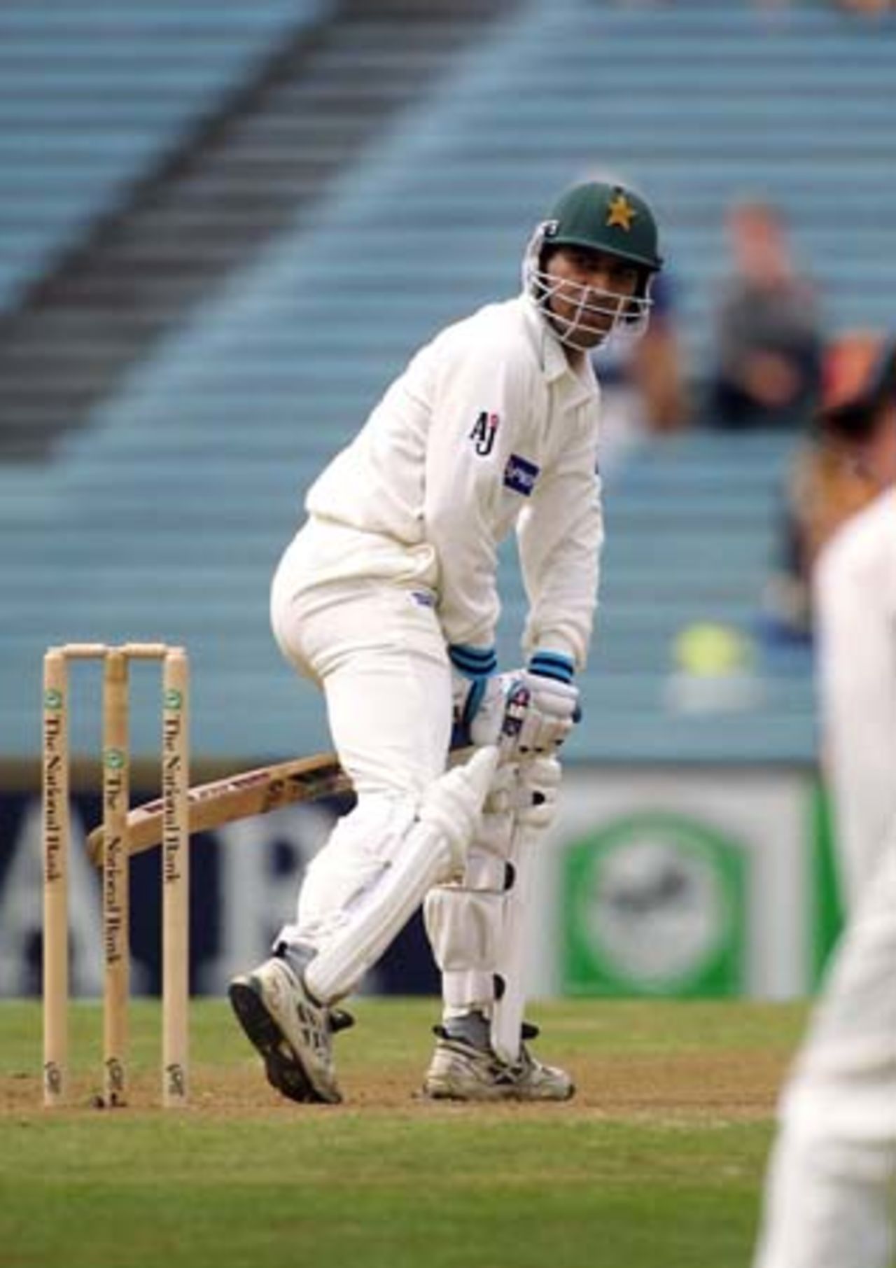 Pakistan opening batsman Saleem Elahi looks back as New Zealand wicket-keeper Adam Parore takes a catch to dismiss him off the bowling of fast medium bowler Daryl Tuffey for 24. 1st Test: New Zealand v Pakistan at Eden Park, Auckland, 8-12 March 2001 (8 March 2001).