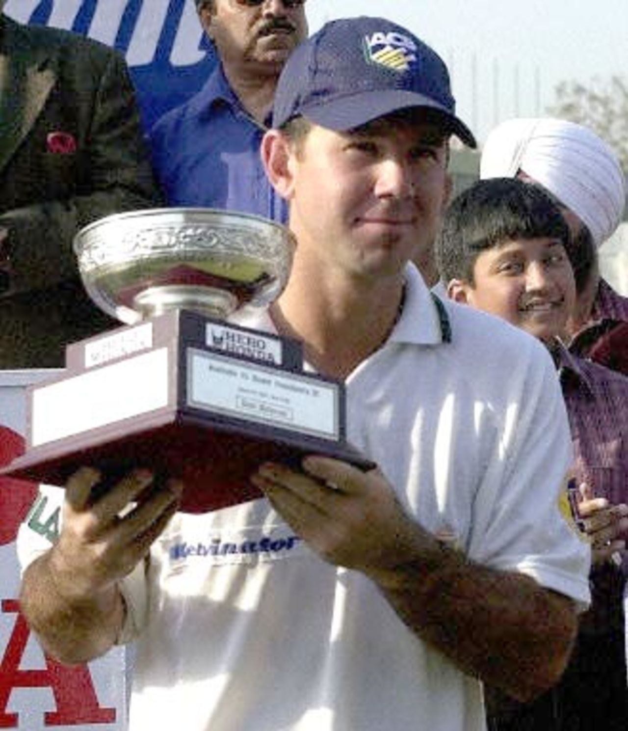 Australian batsman Ricky Ponting hold his best batsman trophy in New Delhi's Ferozshah Kotla ground 08 March 2001. Ponting scored 102 not out in their second innings against Board President's XI at the final day of the three-day match which ended in draw.