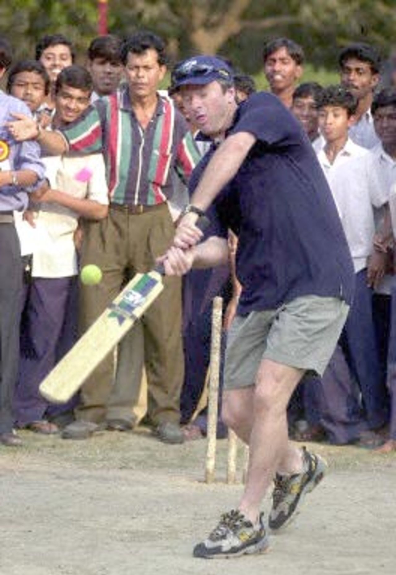09 Mar 2001: Waugh plays a match with the children of Udayan during his visit to the home before the Kolkata Test