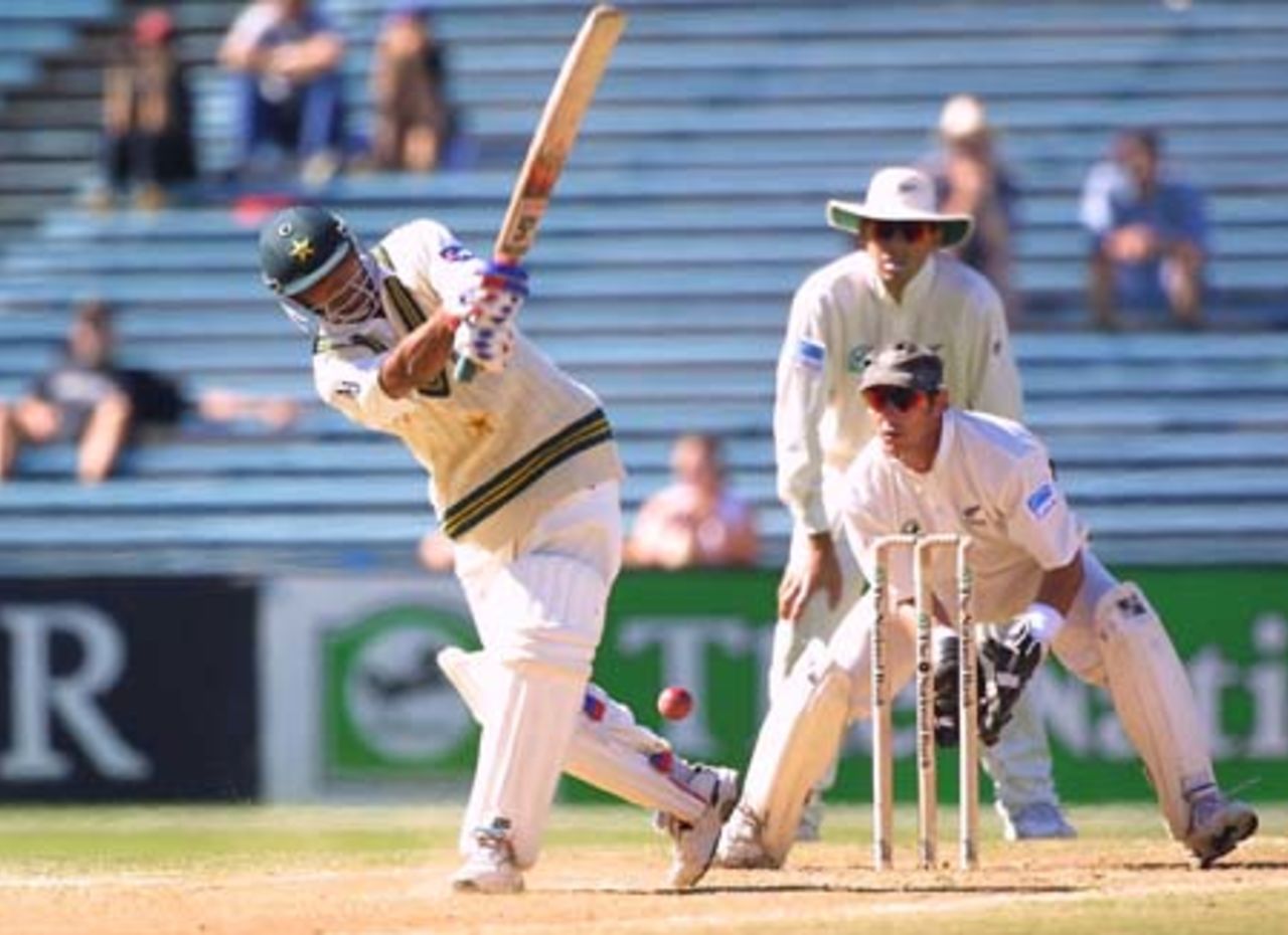Pakistan batsman Yousuf Youhana clips a ball from New Zealand off spinner Paul Wiseman behind square on the leg side during his second innings of 42, while wicket-keeper Adam Parore and slip fielder Stephen Fleming look on. 1st Test: New Zealand v Pakistan at Eden Park, Auckland, 8-12 March 2001 (11 March 2001).