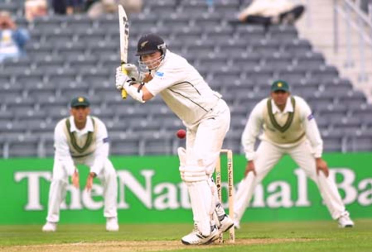 New Zealand opening batsman Matthew Bell is struck uncomfortably by a ball from Pakistan fast bowler Mohammad Sami during his first innings of 75. Slip fielders Younis Khan and Inzamam-ul-Haq look on in the background. 2nd Test: New Zealand v Pakistan at Jade Stadium, Christchurch, 15-19 March 2001 (15 March 2001).
