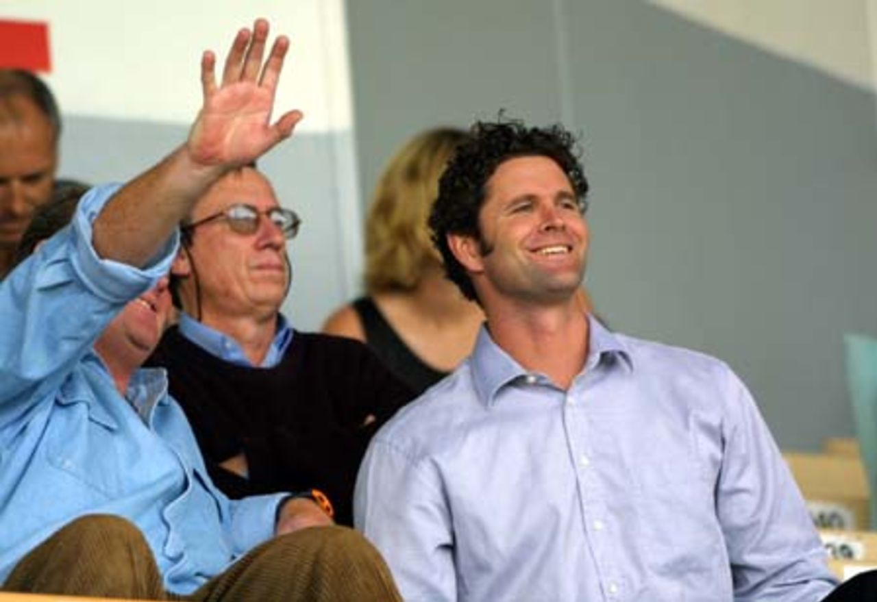 Injured New Zealand all-rounder Chris Cairns sits in the stands watching the first day's play. 2nd Test: New Zealand v Pakistan at Jade Stadium, Christchurch, 15-19 March 2001 (15 March 2001).